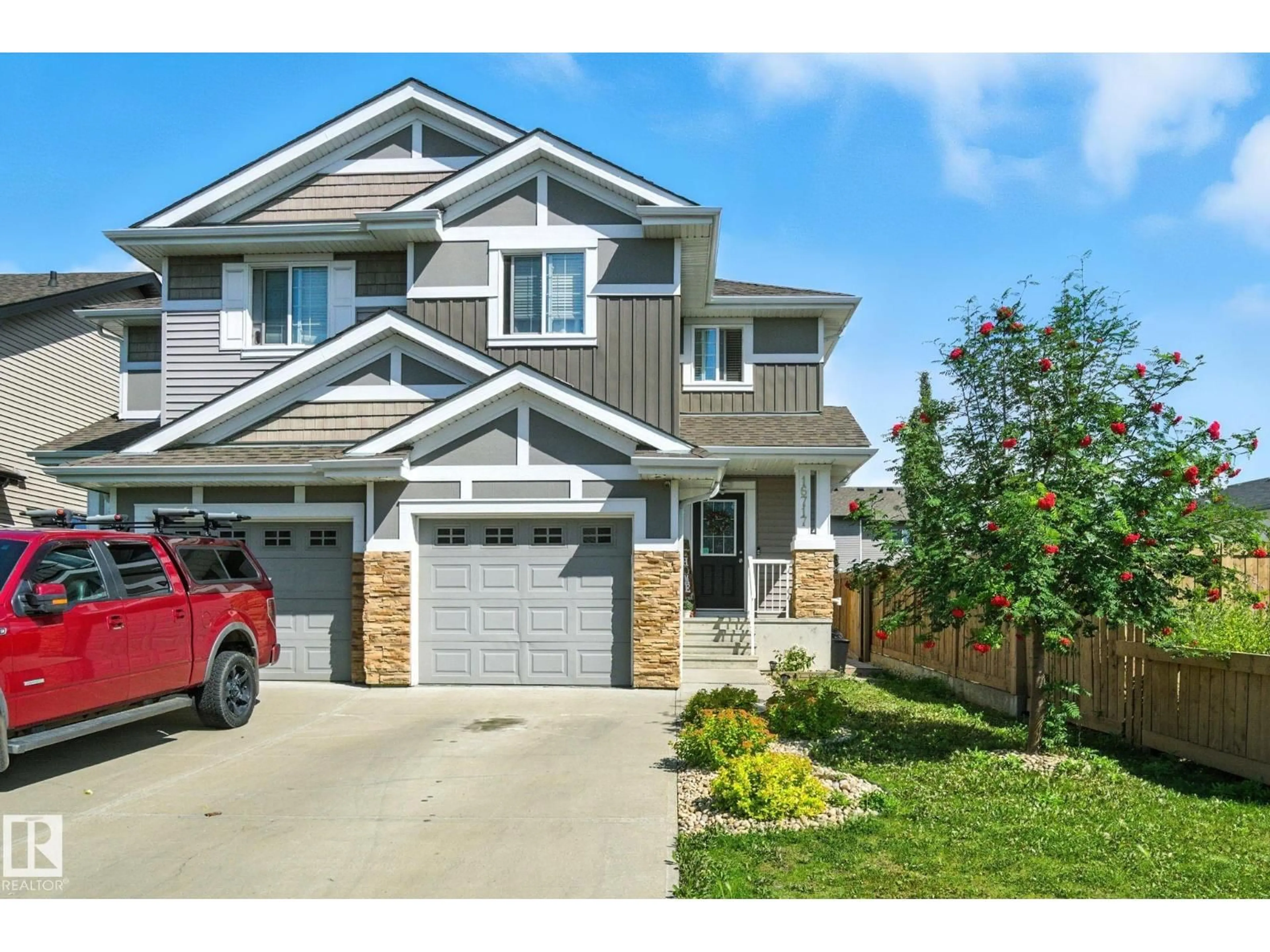 Home with vinyl exterior material, street for 16717 120 ST NW, Edmonton Alberta T5X0G5