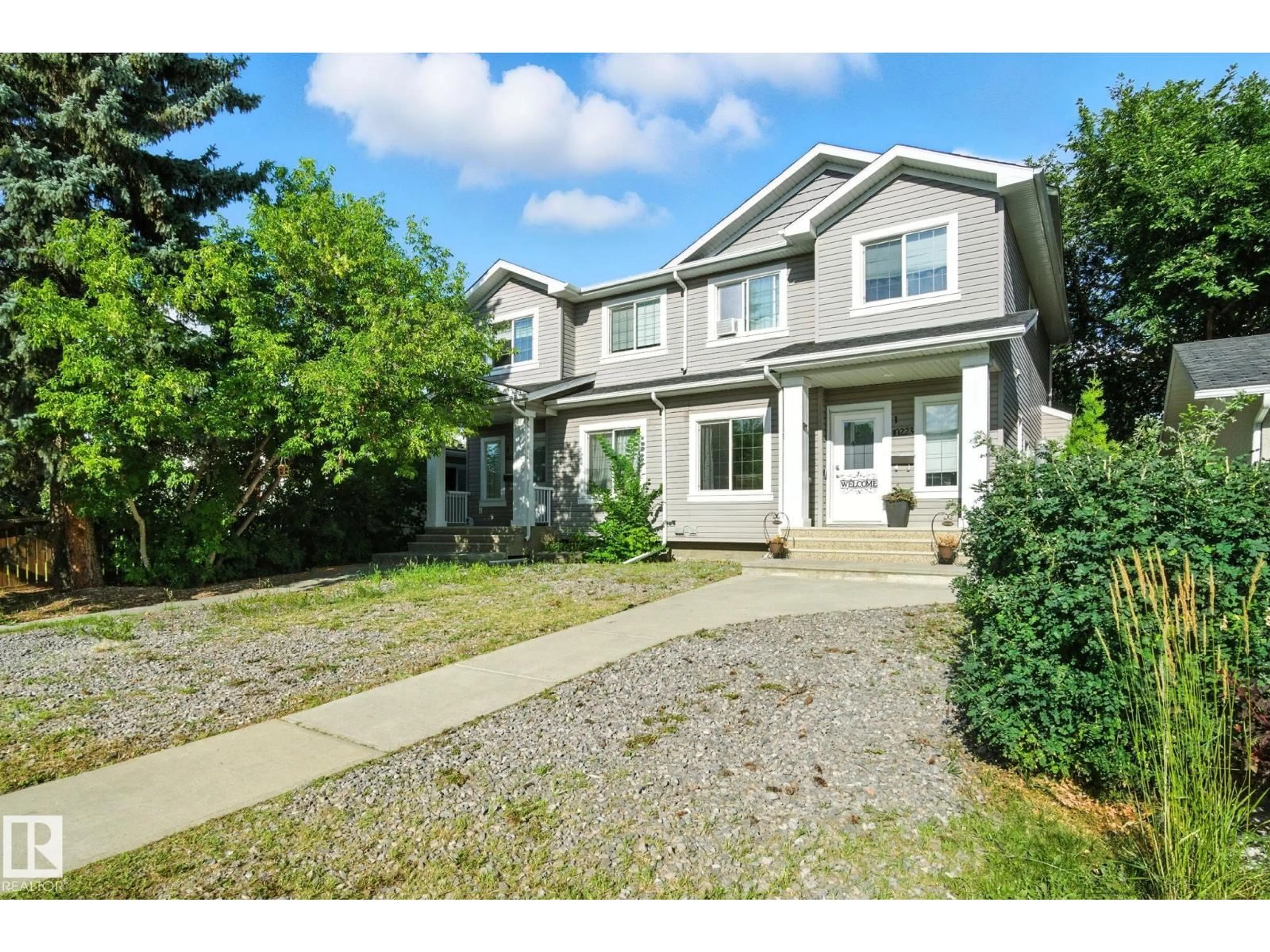 Home with vinyl exterior material, street for NW - 10223 155 ST, Edmonton Alberta T5P2L8