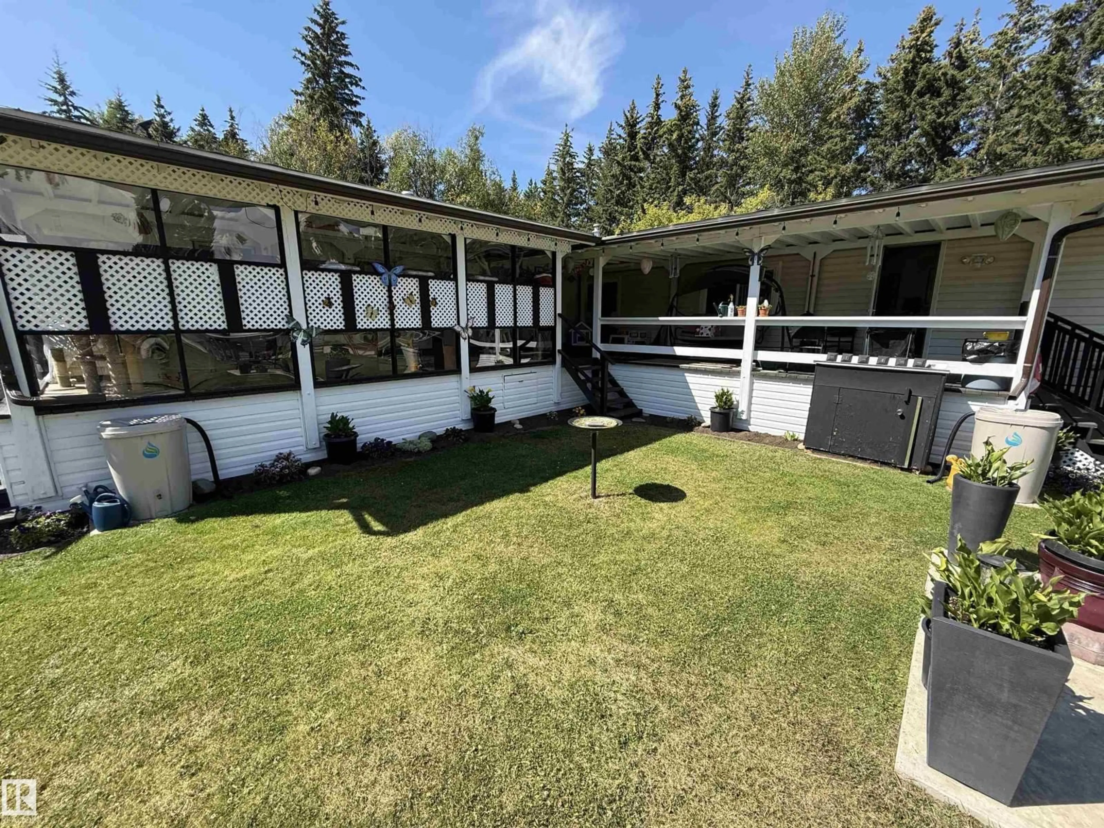 A pic from outside/outdoor area/front of a property/back of a property/a pic from drone, unknown for 623005 RR 60, Rural Woodlands County Alberta T0G1A0