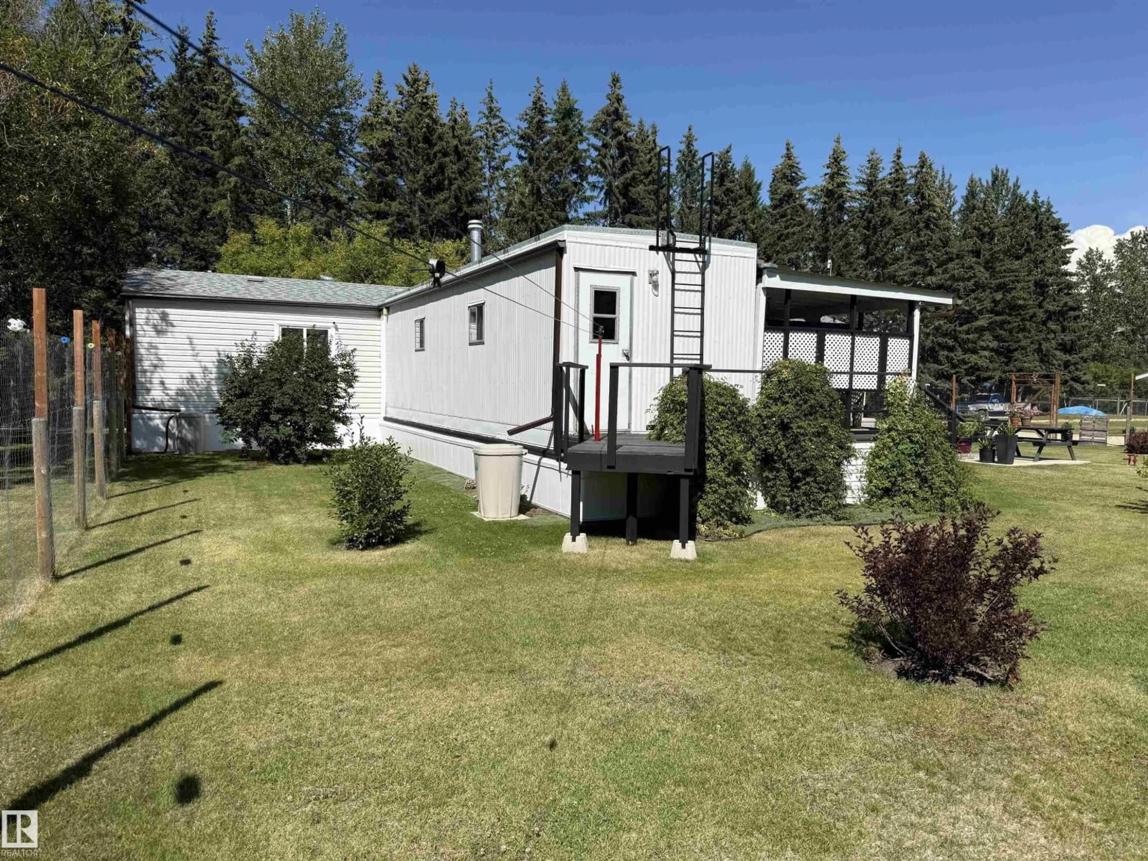 A pic from outside/outdoor area/front of a property/back of a property/a pic from drone, unknown for 623005 RR 60, Rural Woodlands County Alberta T0G1A0