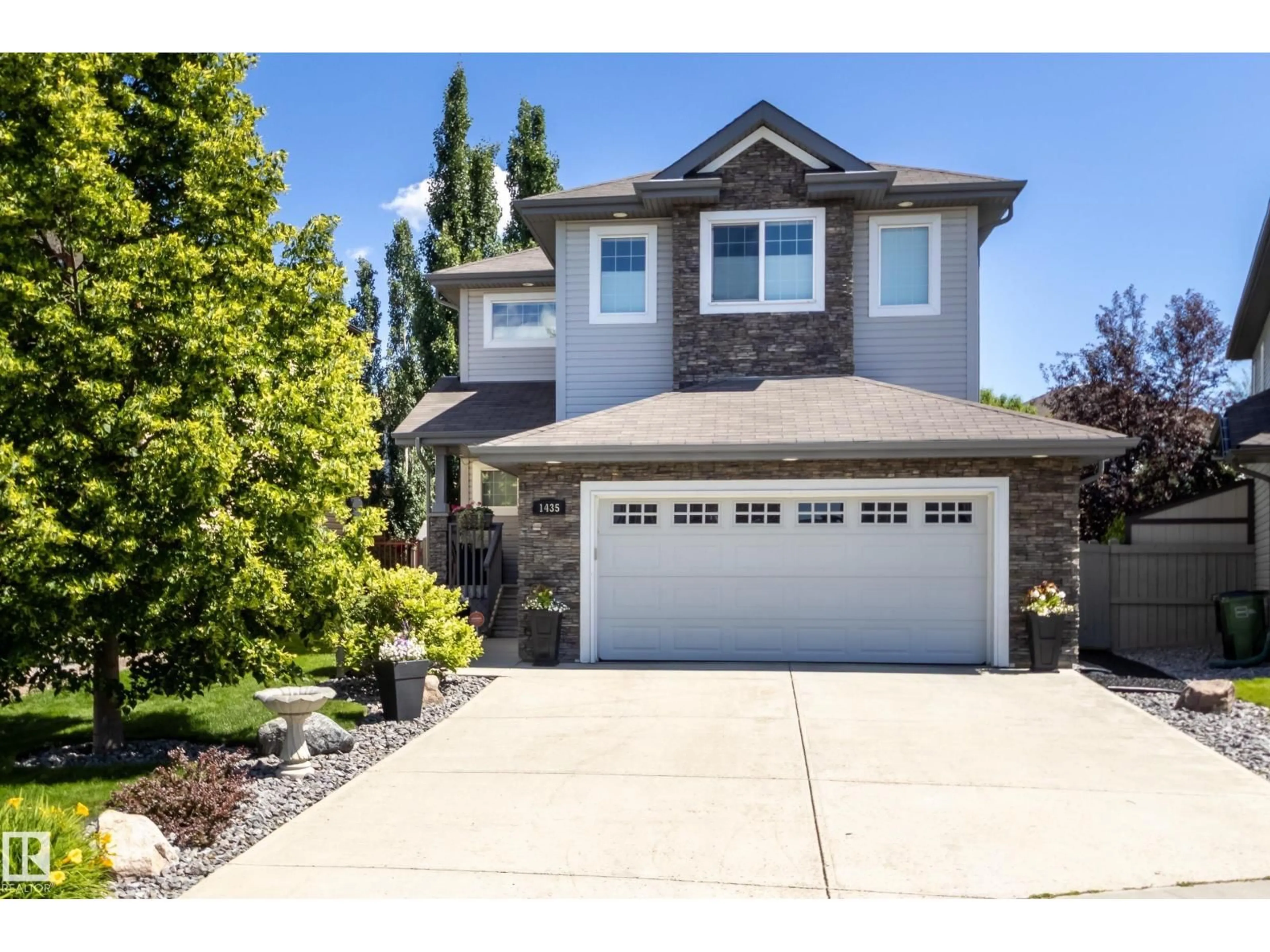 Home with vinyl exterior material, street for SW - 1435 114A ST, Edmonton Alberta T6W0N3