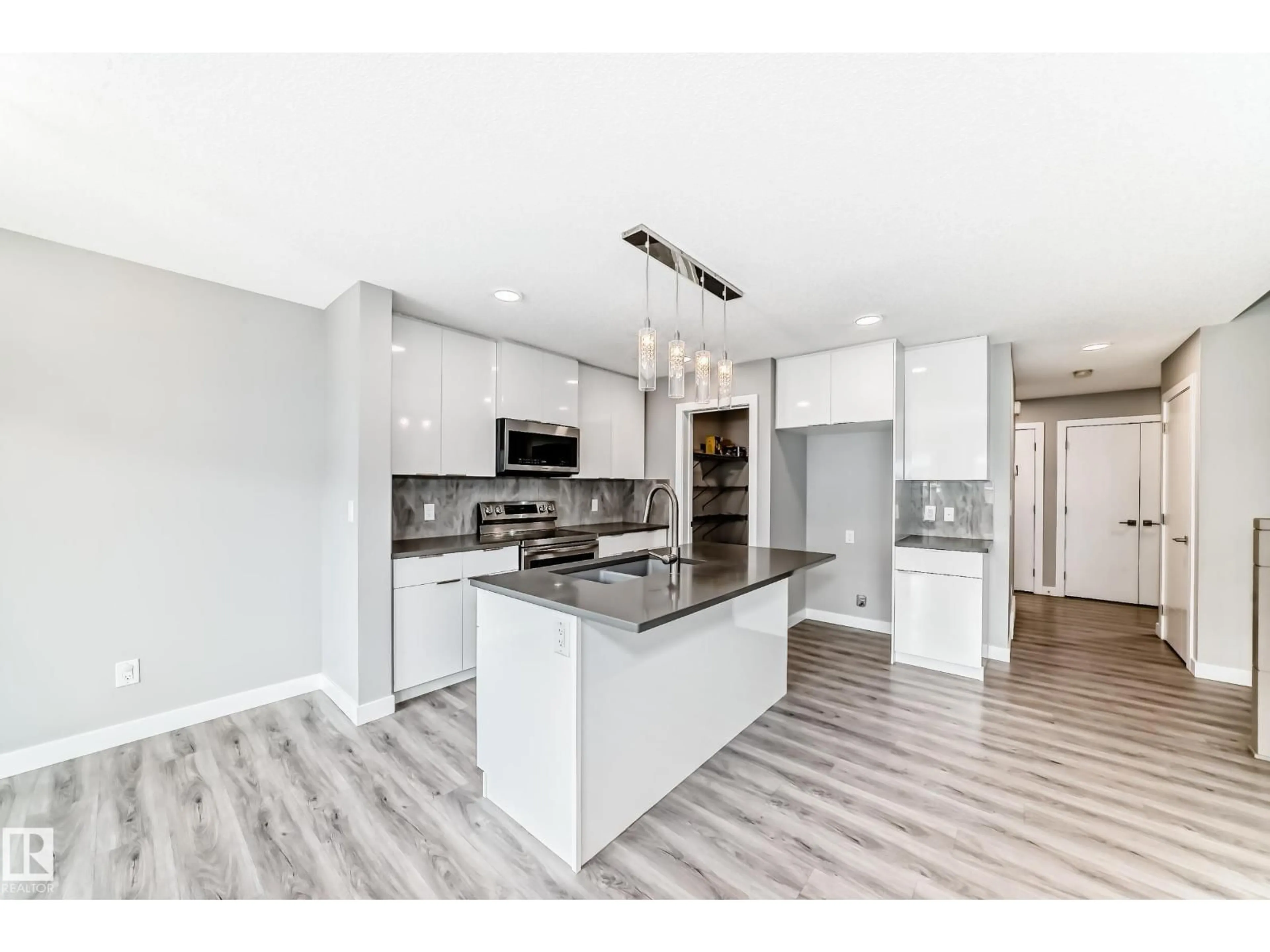 Open concept kitchen, unknown for NW - 17513 65 ST, Edmonton Alberta T5Y4A7