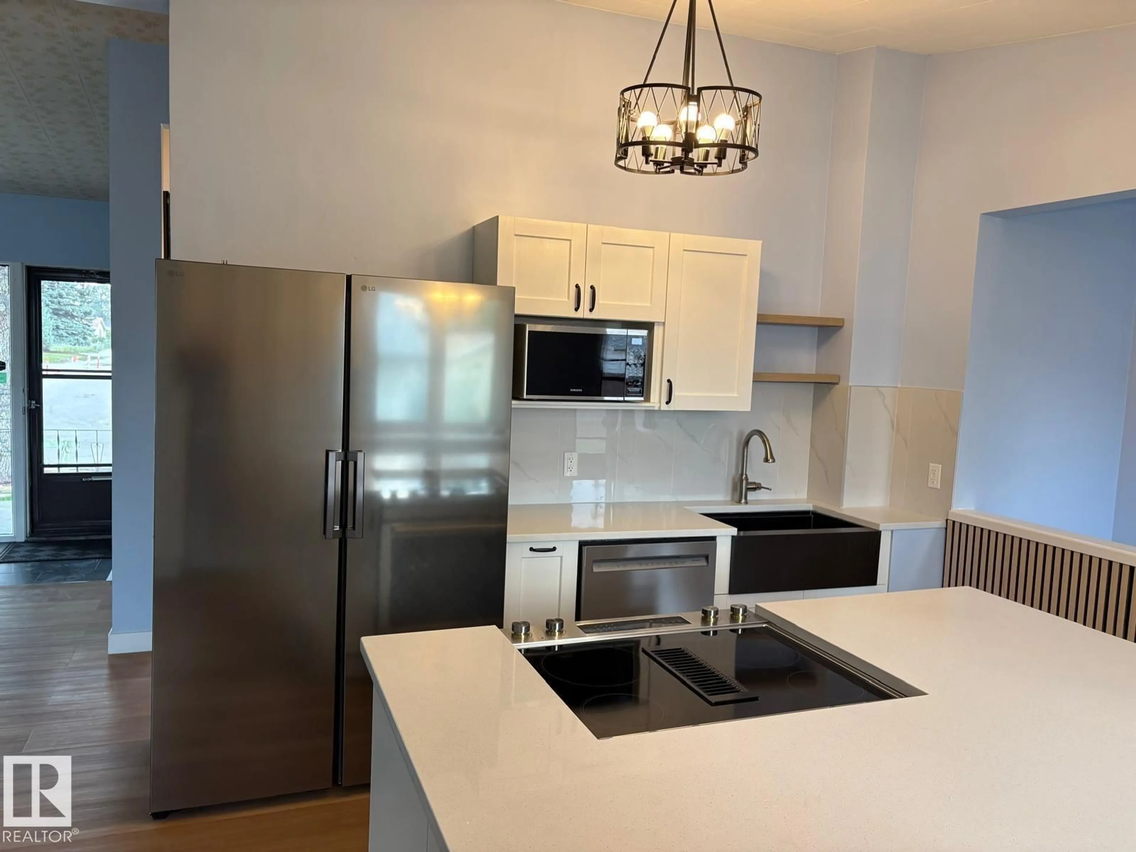 Open concept kitchen, unknown for 6808 95 AV NW, Edmonton Alberta T6B1A8