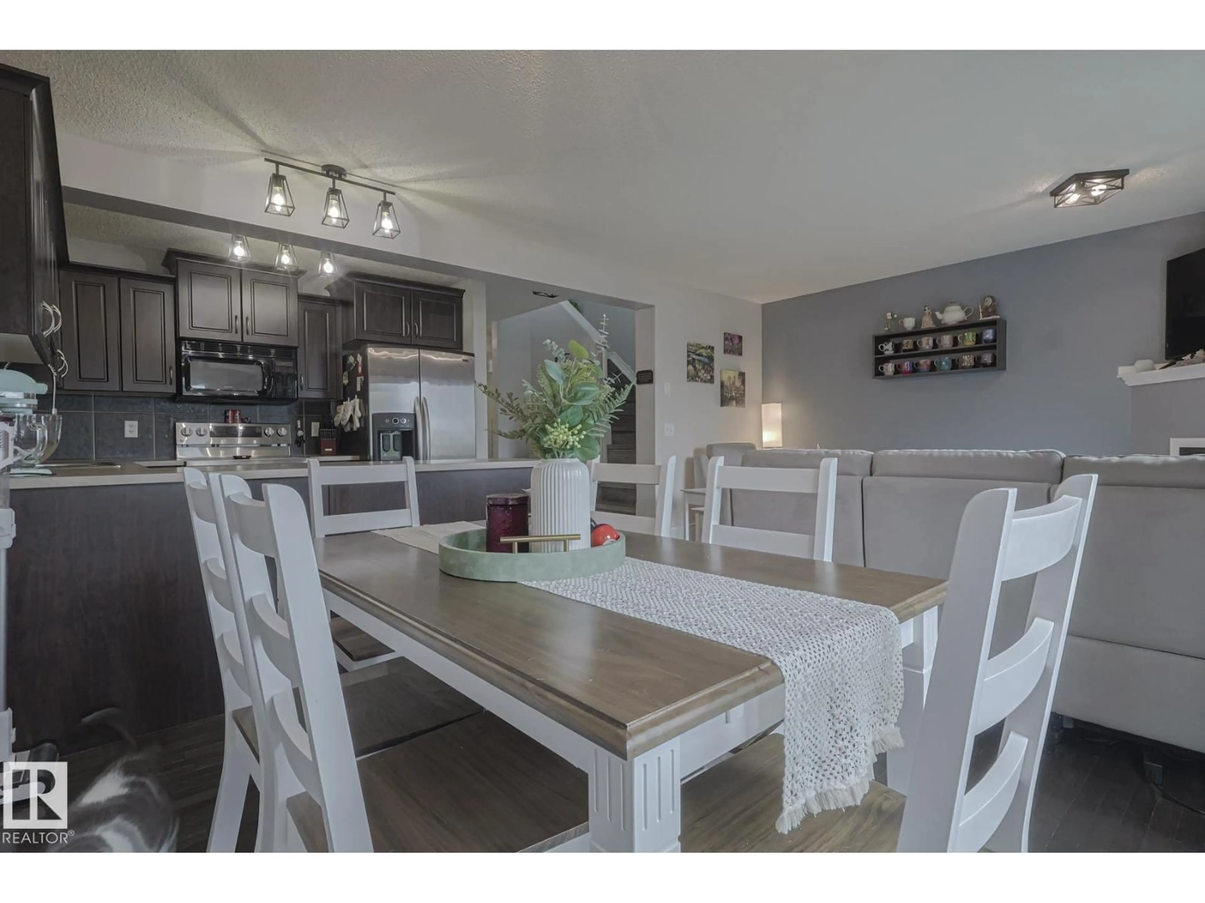 Open concept kitchen, wood/laminate floor for 2 VANESSA AV, Spruce Grove Alberta T7X0B9