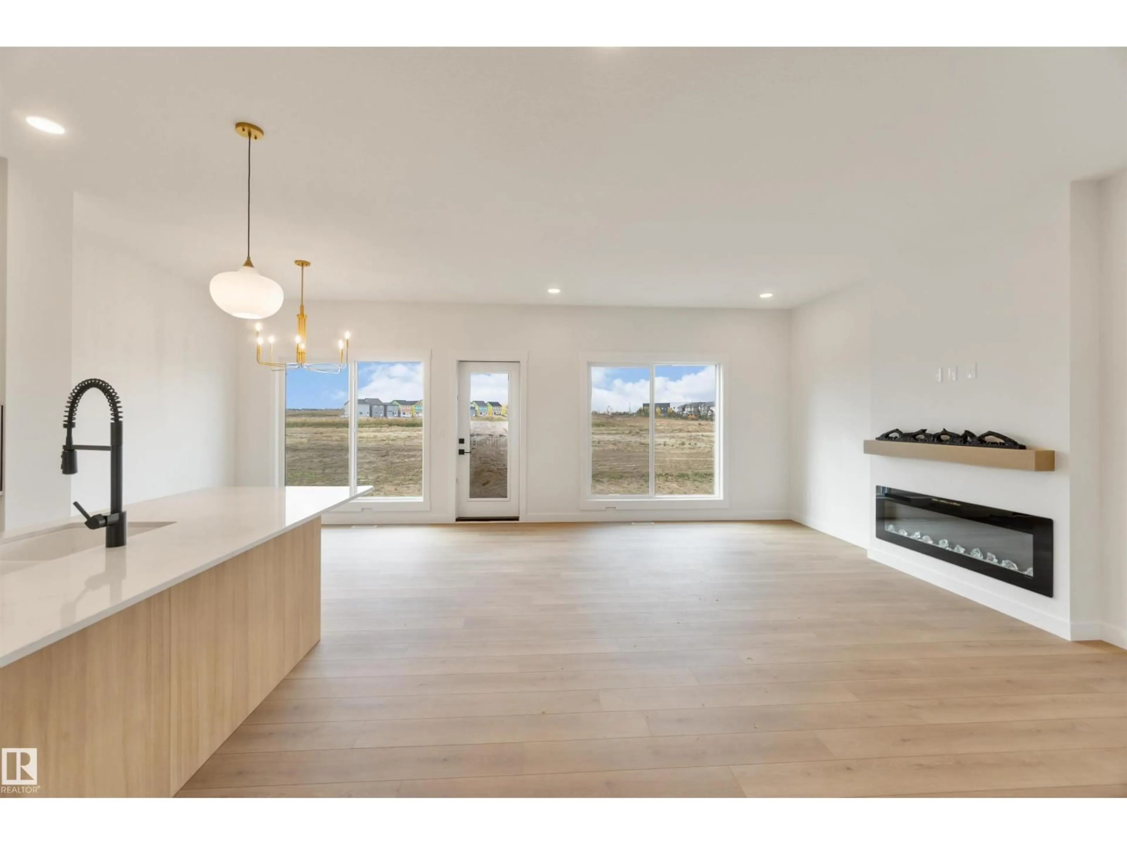 Open concept kitchen, wood/laminate floor for 1114 CRISTALL CR, Edmonton Alberta T6W2Z1