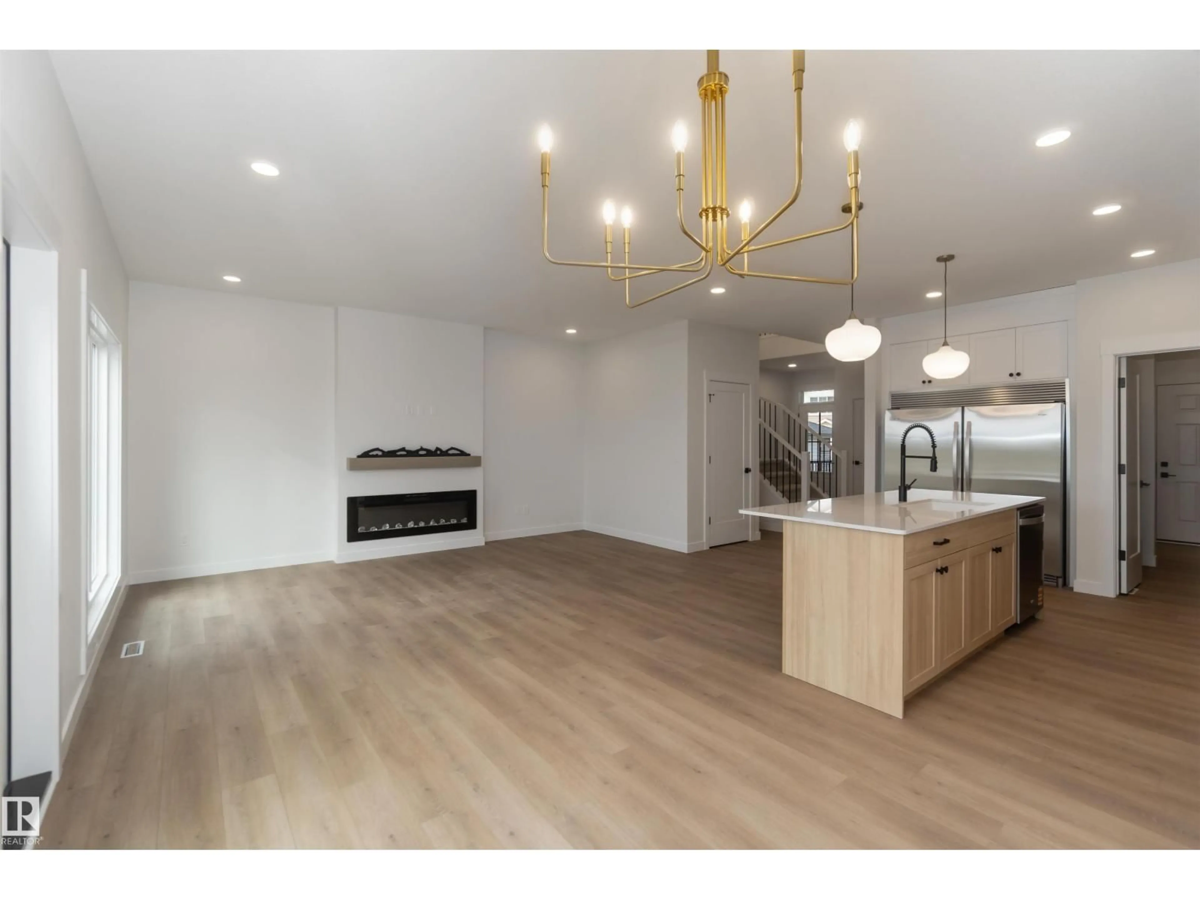 Open concept kitchen, wood/laminate floor for 1114 CRISTALL CR, Edmonton Alberta T6W2Z1