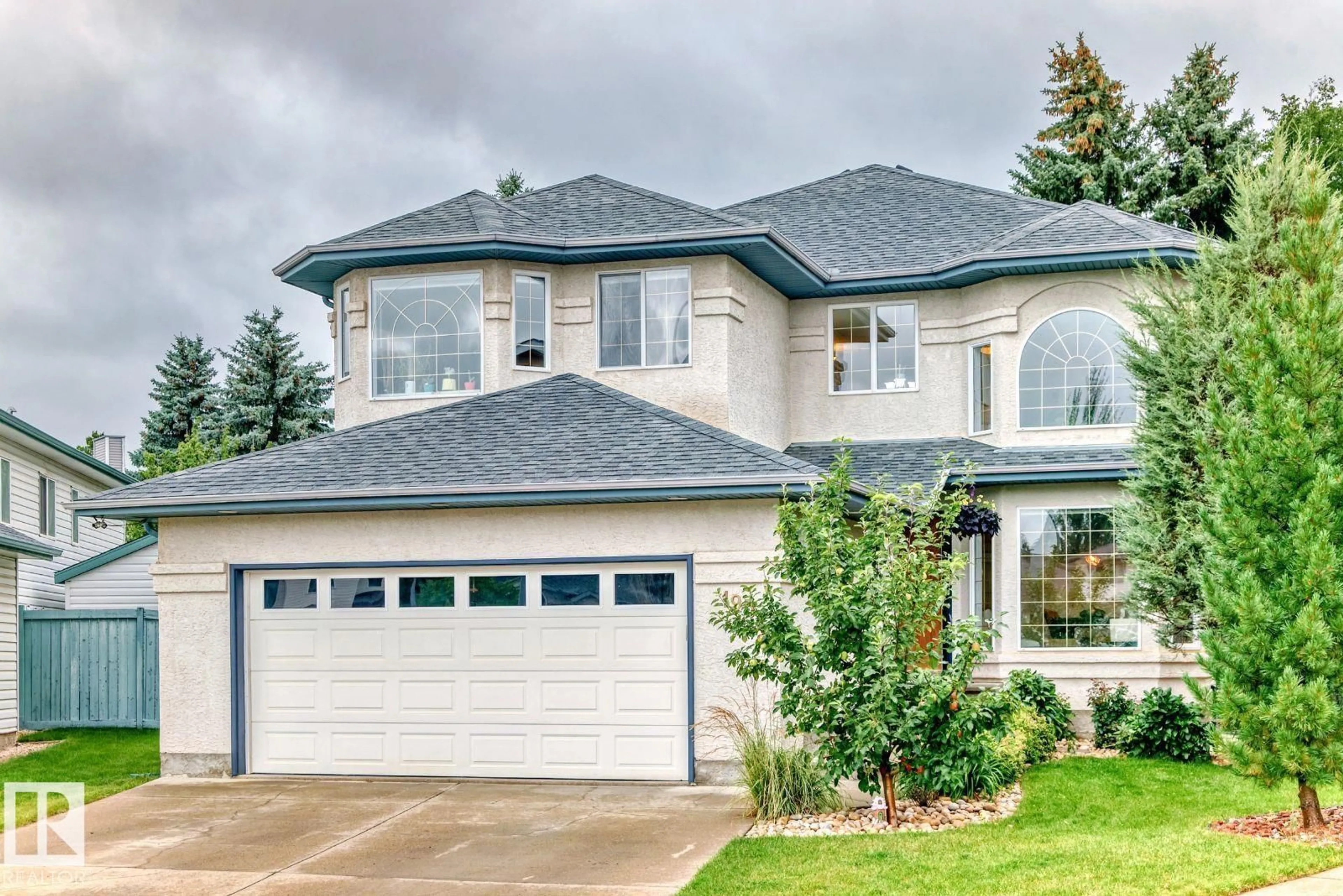 Home with vinyl exterior material, street for 195 DECHENE RD, Edmonton Alberta T6M2M8