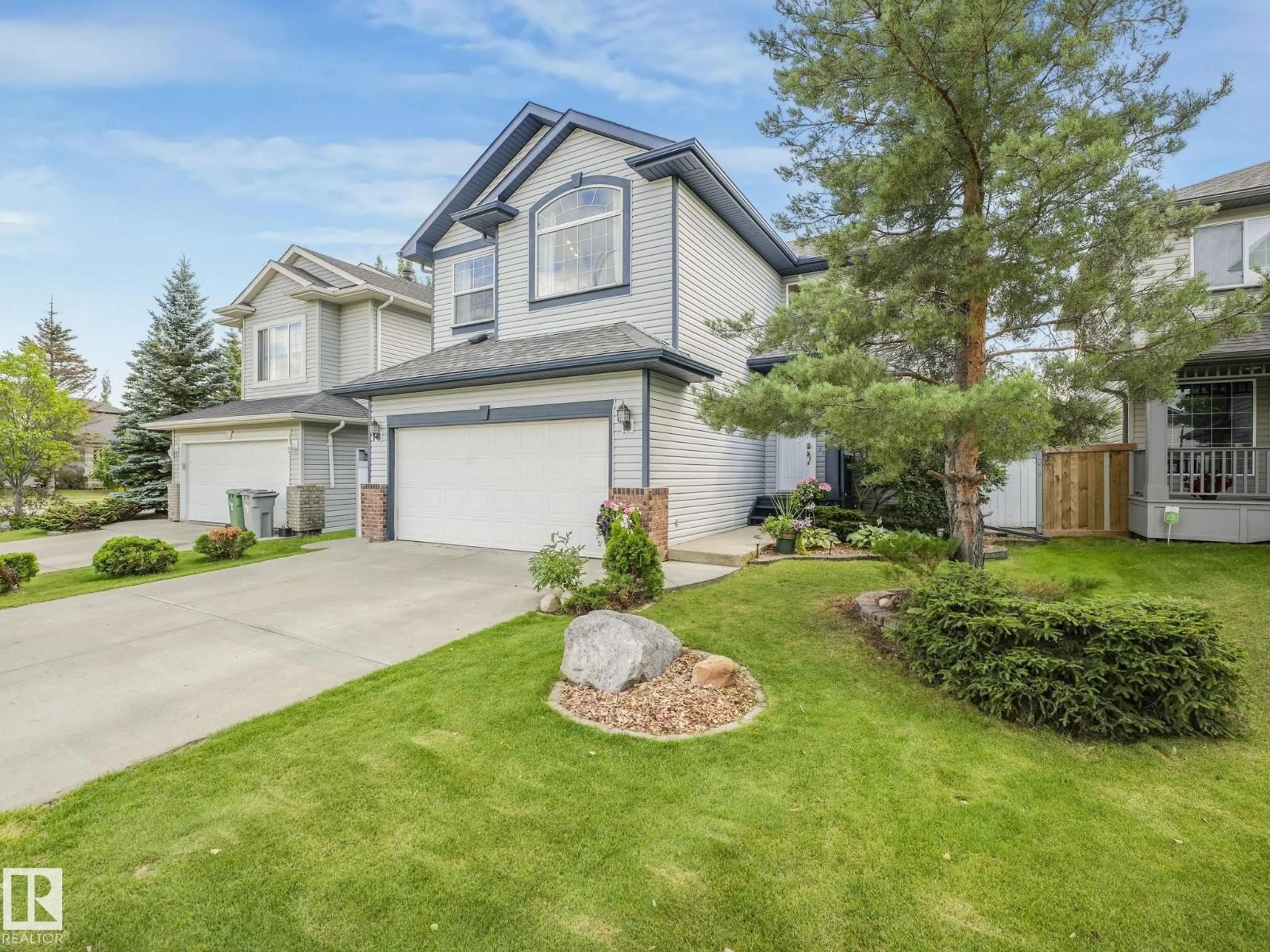 Home with vinyl exterior material, street for 97 BONIN CR, Beaumont Alberta T4X1R9
