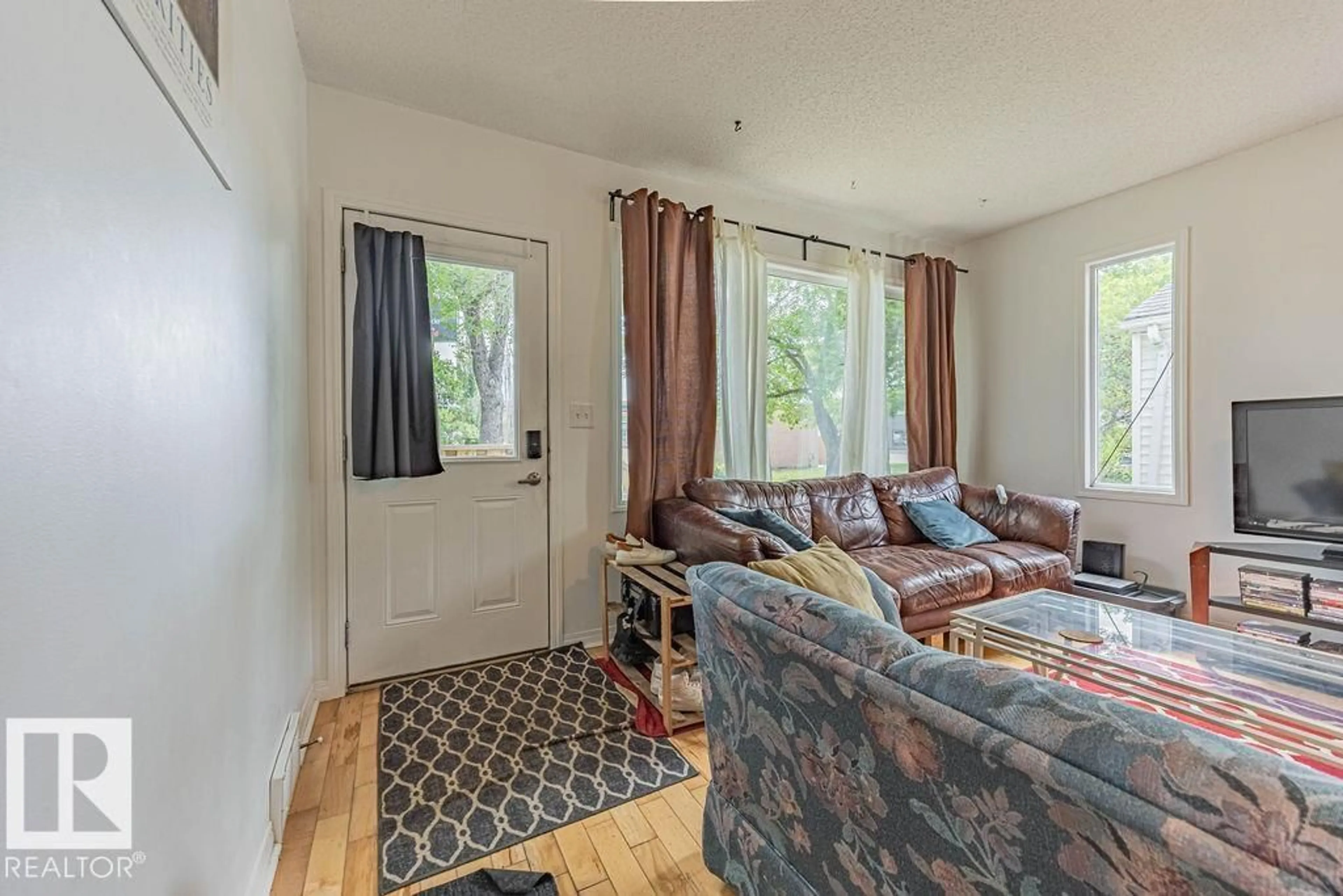 Living room with furniture, unknown for NW - 11606 67 ST, Edmonton Alberta T5B1L8
