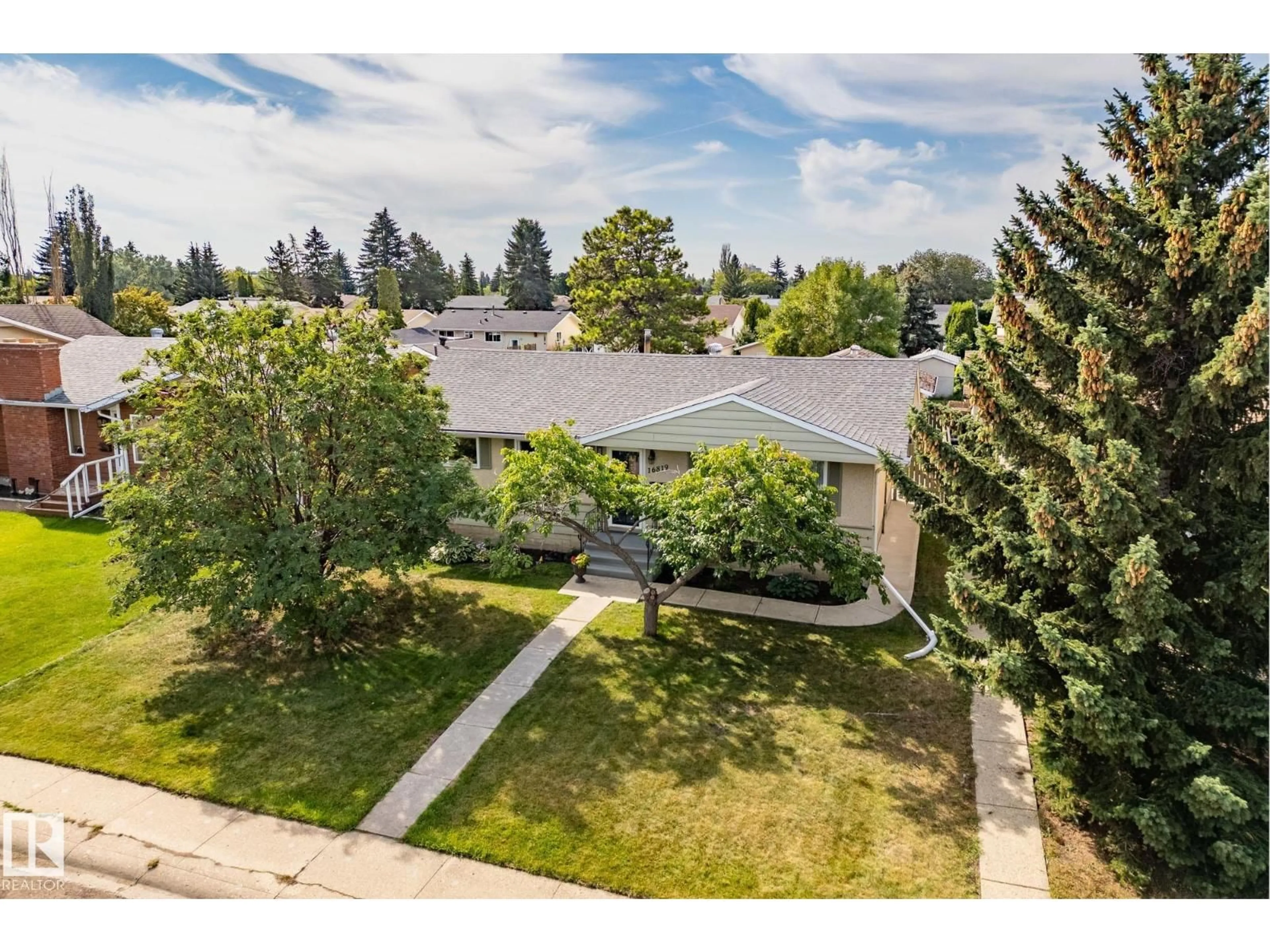 A pic from outside/outdoor area/front of a property/back of a property/a pic from drone, street for 16819 98 AV, Edmonton Alberta T5P0G9