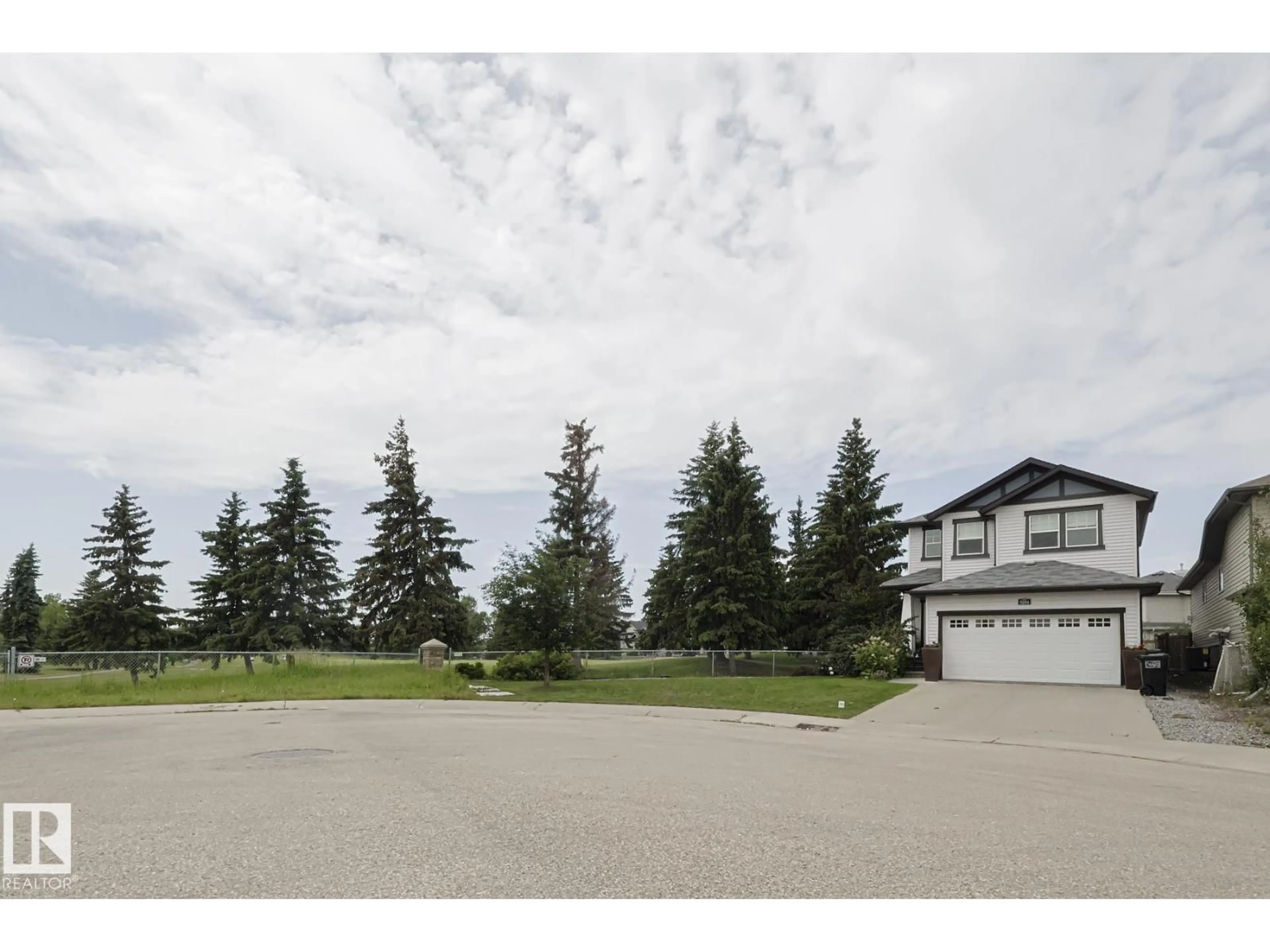 A pic from outside/outdoor area/front of a property/back of a property/a pic from drone, street for NW - 9204 209 ST, Edmonton Alberta T5T3Y5