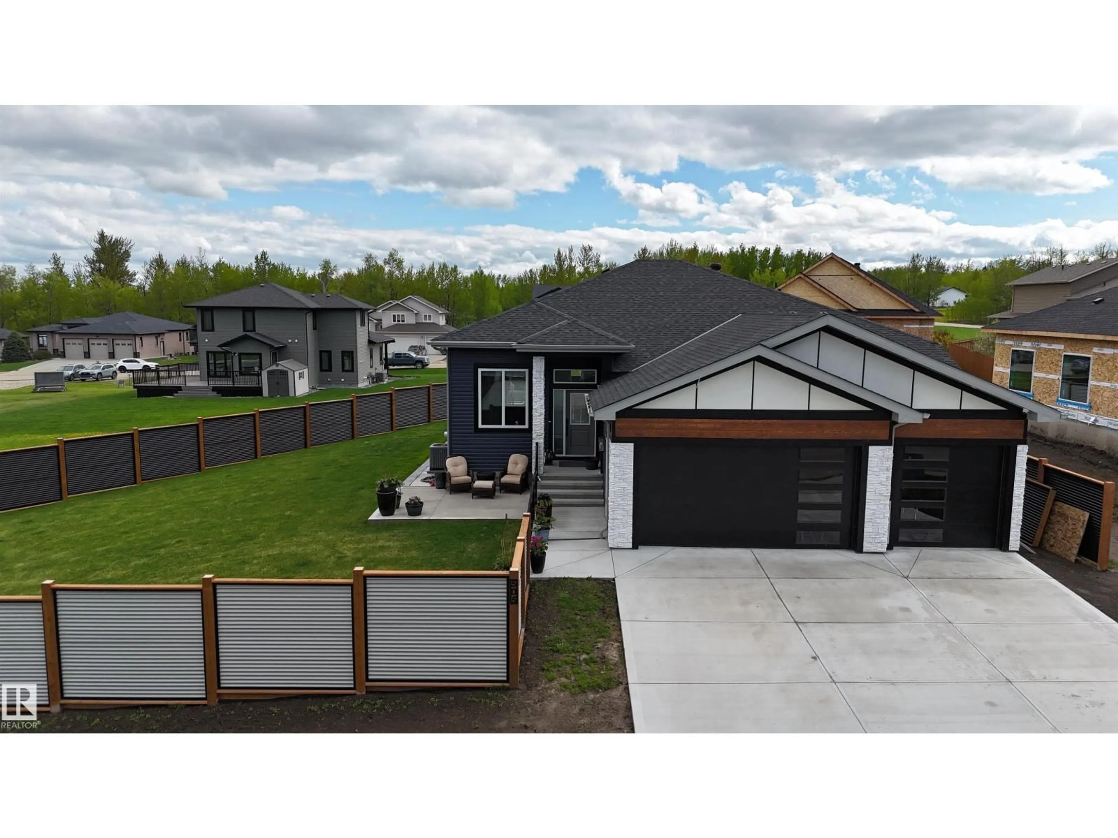 A pic from outside/outdoor area/front of a property/back of a property/a pic from drone, street for 505 49119 RANGE RD 73, Rural Brazeau County Alberta T7A0B9