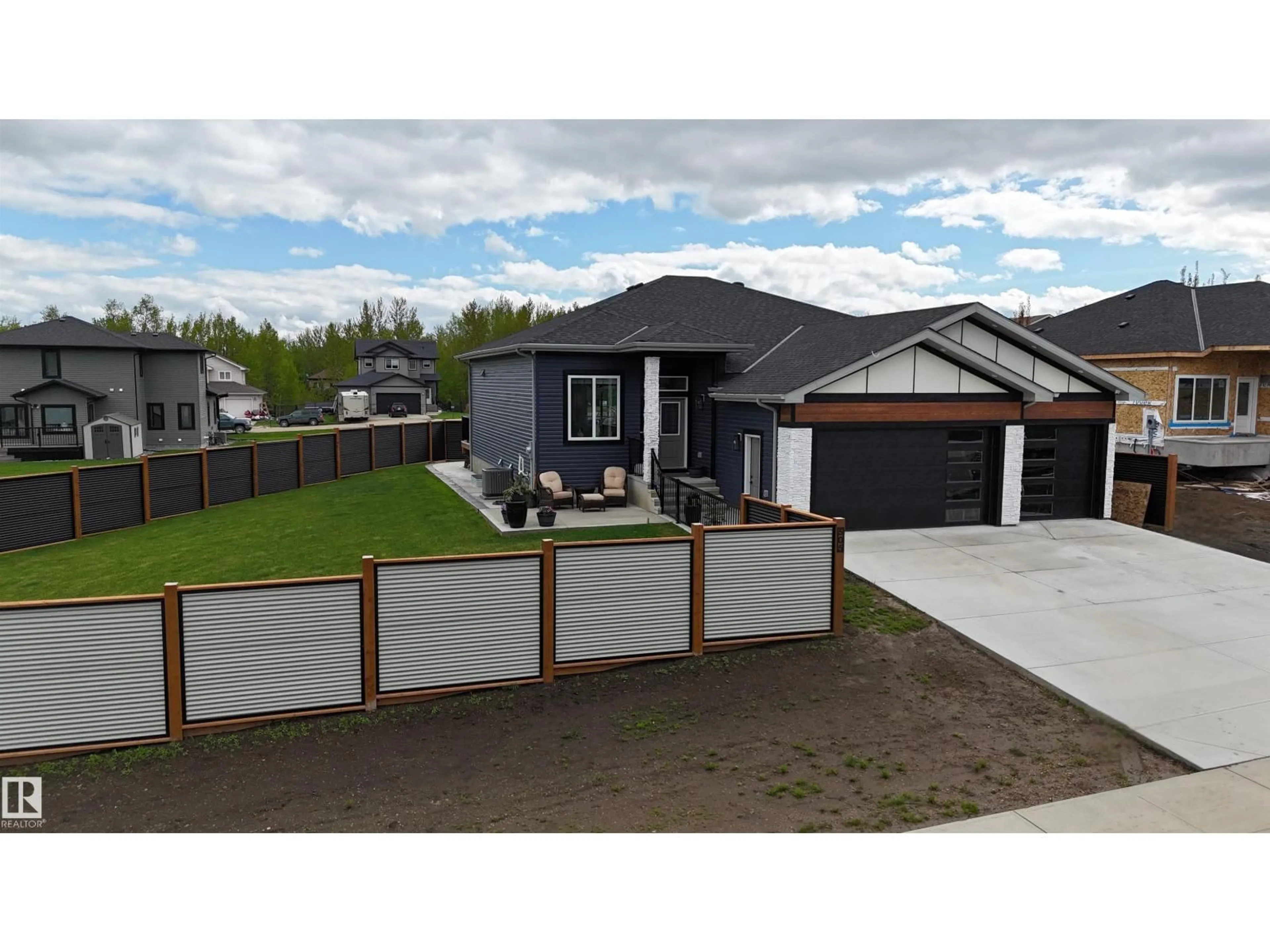 A pic from outside/outdoor area/front of a property/back of a property/a pic from drone, street for 505 49119 RANGE RD 73, Rural Brazeau County Alberta T7A0B9