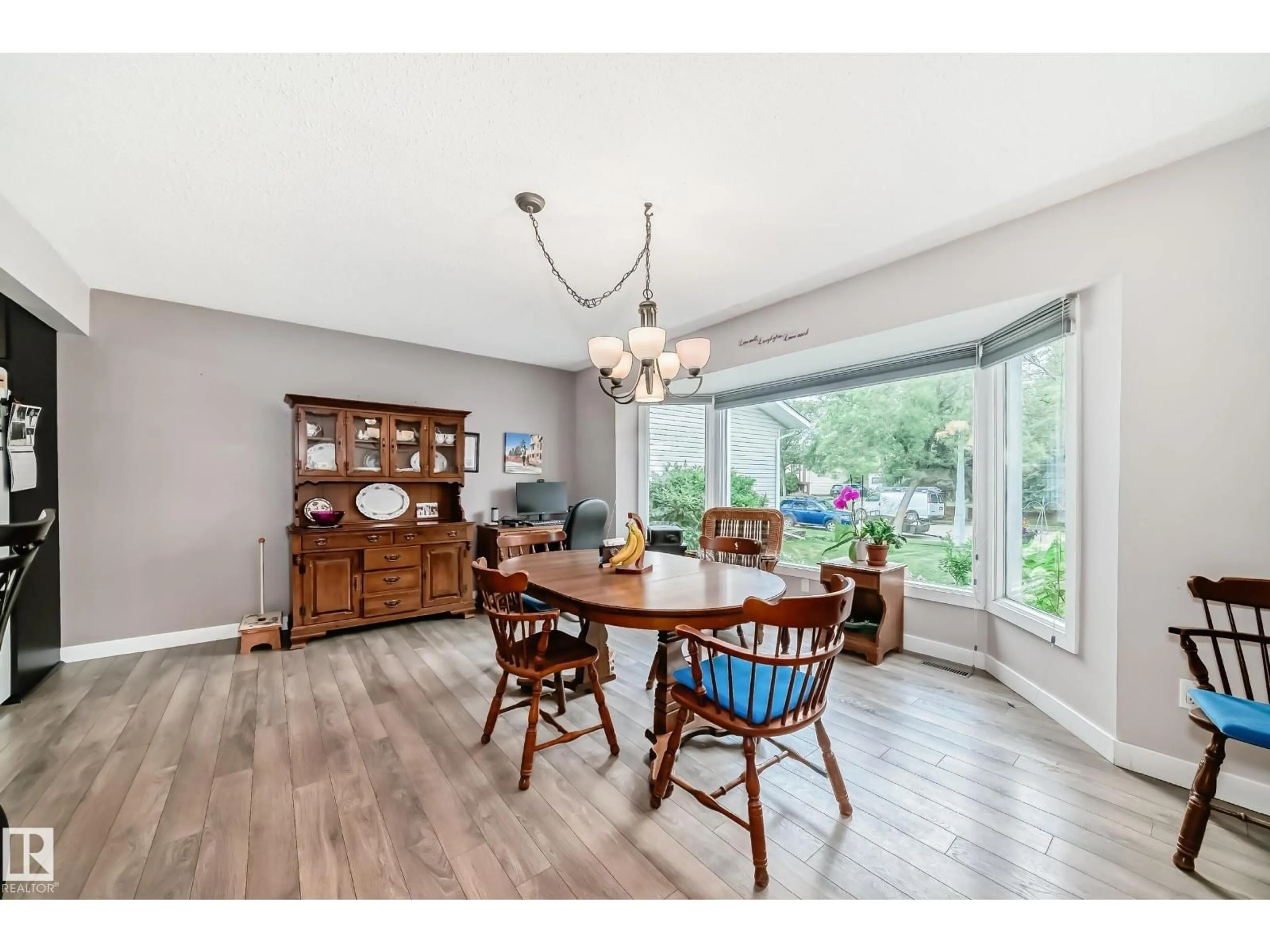 Dining room, wood/laminate floor for 10 ABBEY CR, St. Albert Alberta T8N2X2
