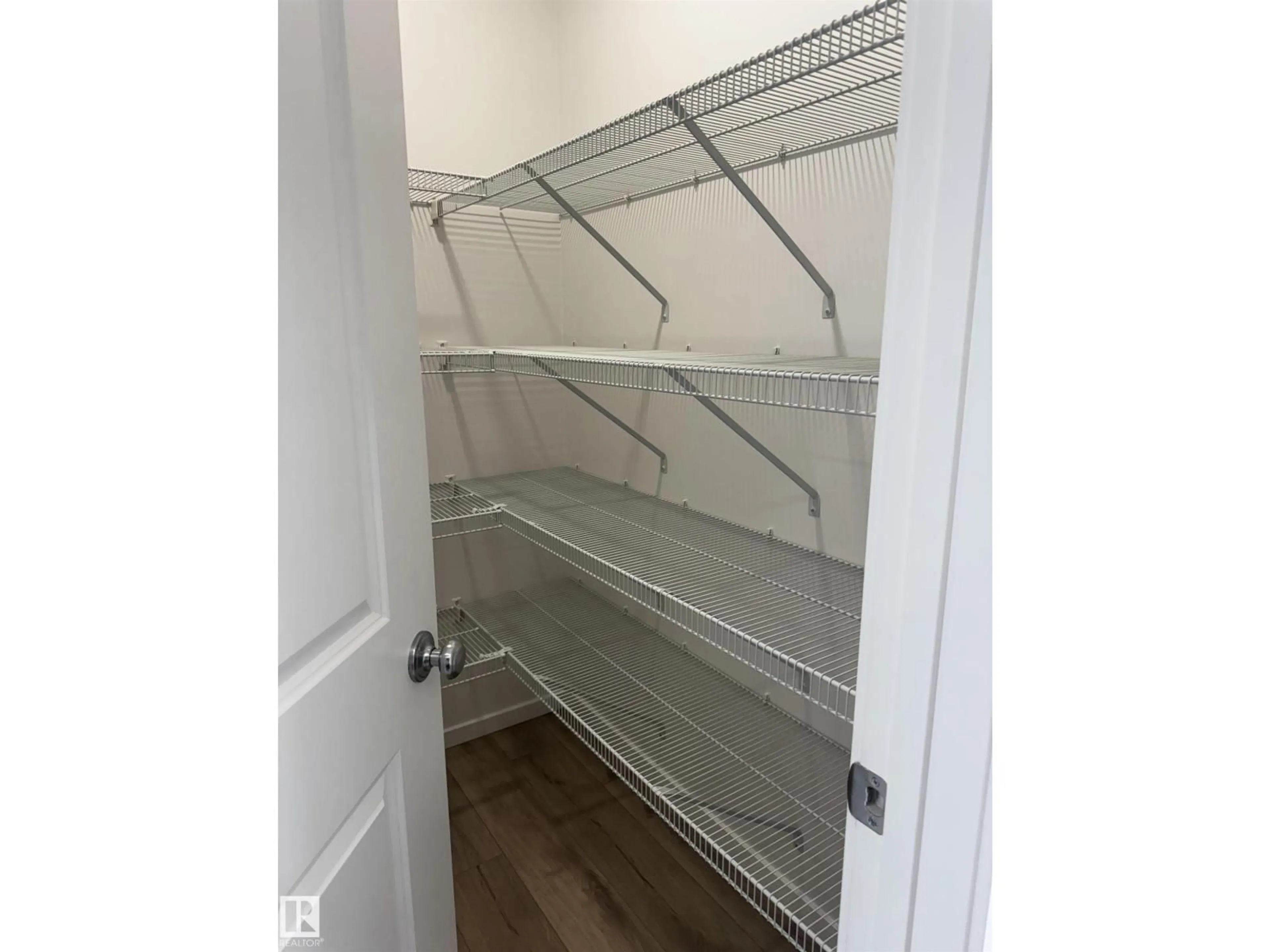 Storage room or clothes room or walk-in closet for NW - 18940 28 AV, Edmonton Alberta T6M3H2