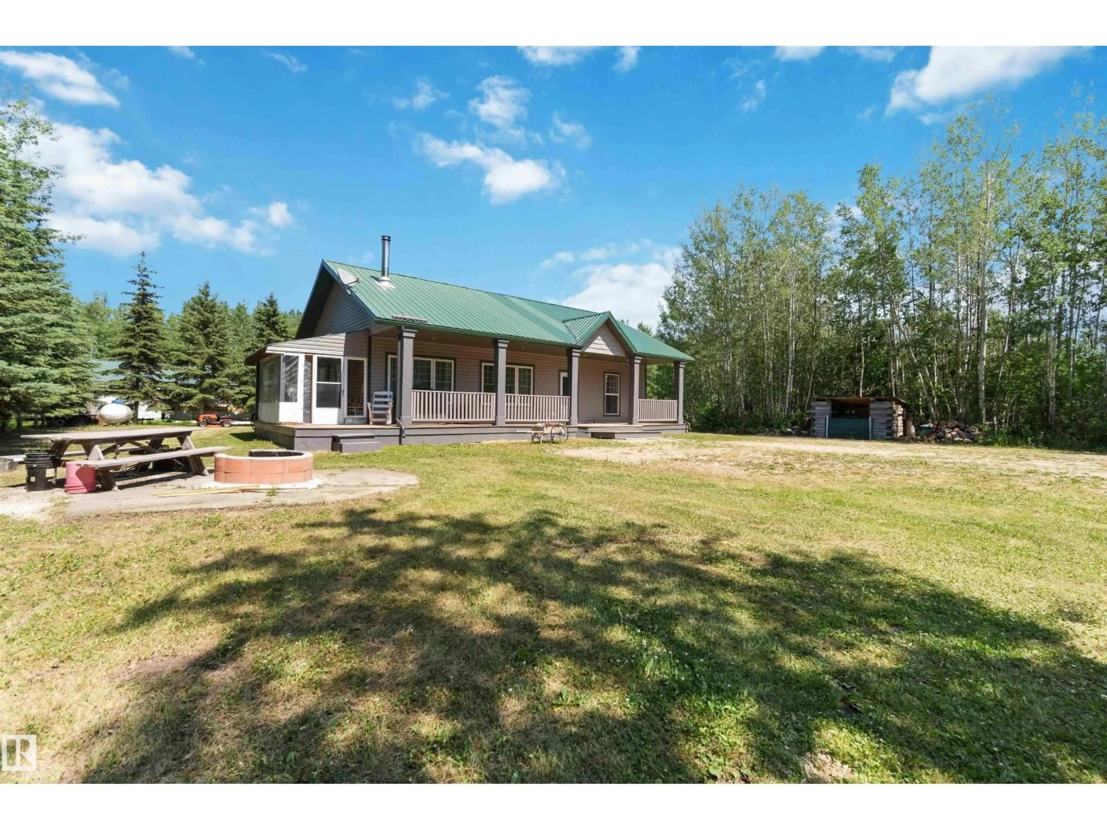 A pic from outside/outdoor area/front of a property/back of a property/a pic from drone, unknown for 110 3510 STE. ANNE TR, Rural Lac Ste. Anne County Alberta T0E0S0