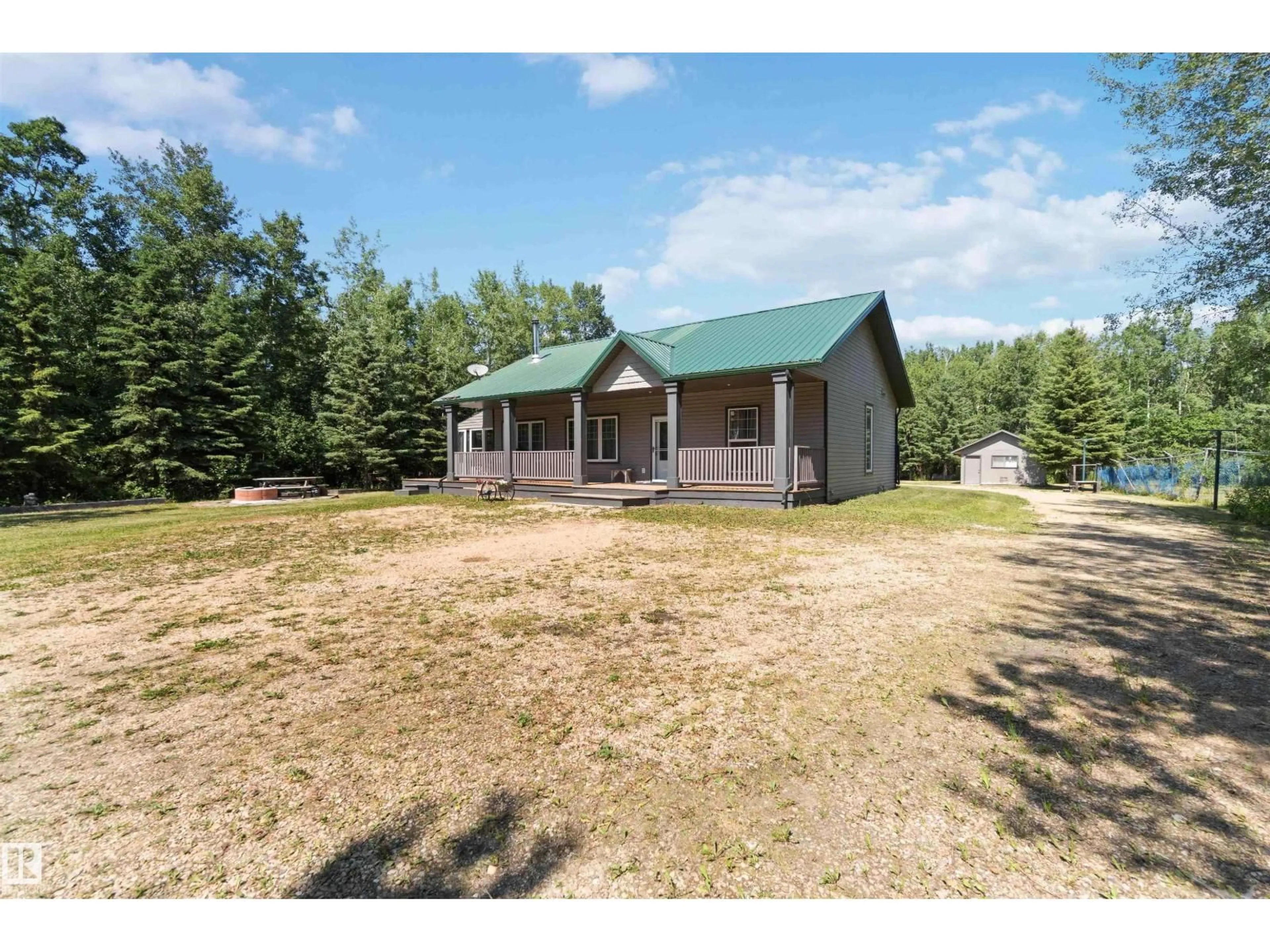 A pic from outside/outdoor area/front of a property/back of a property/a pic from drone, building for 110 3510 STE. ANNE TR, Rural Lac Ste. Anne County Alberta T0E0S0