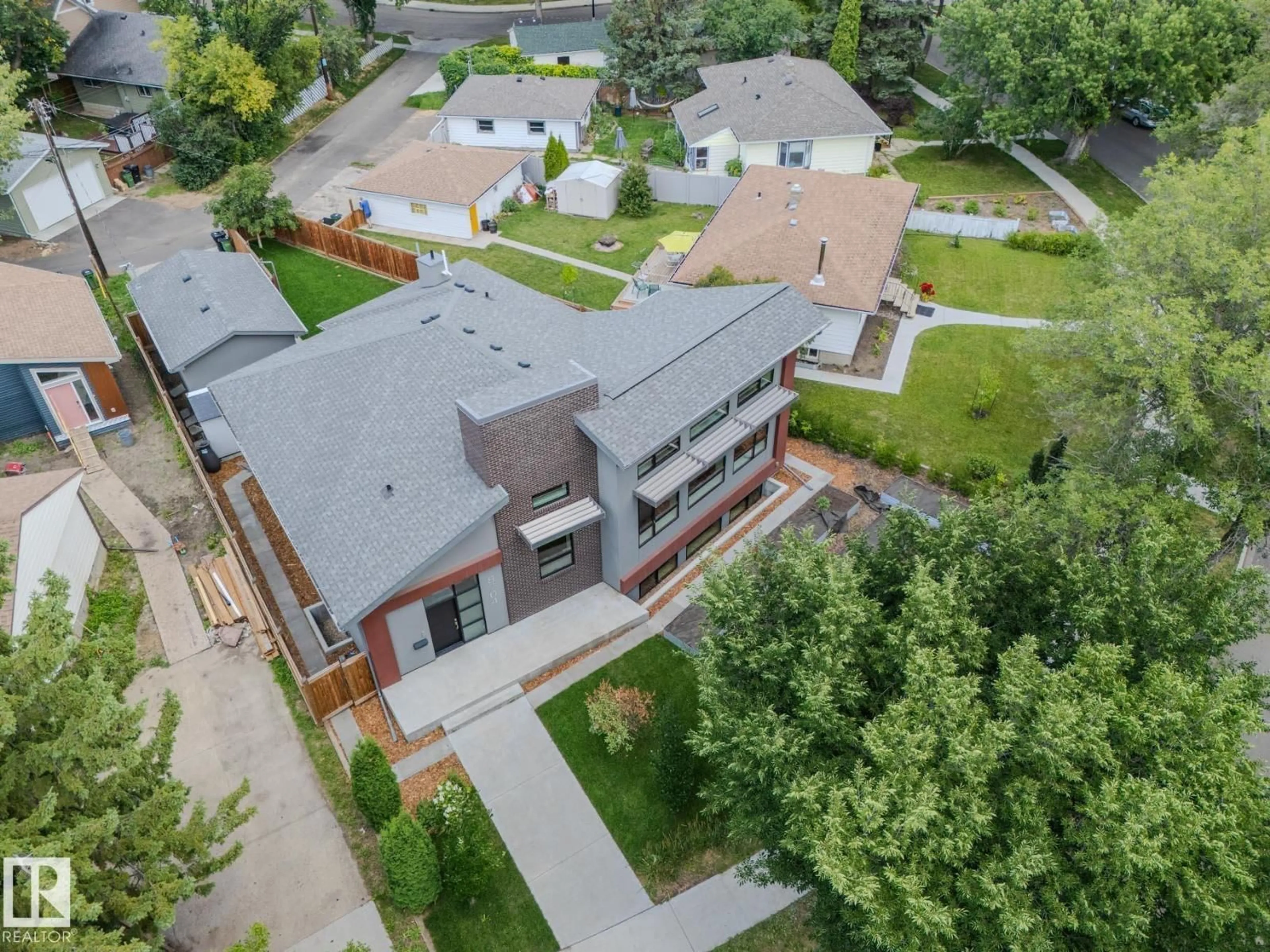 A pic from outside/outdoor area/front of a property/back of a property/a pic from drone, unknown for NW - 8704 92B AV, Edmonton Alberta T6C1S9