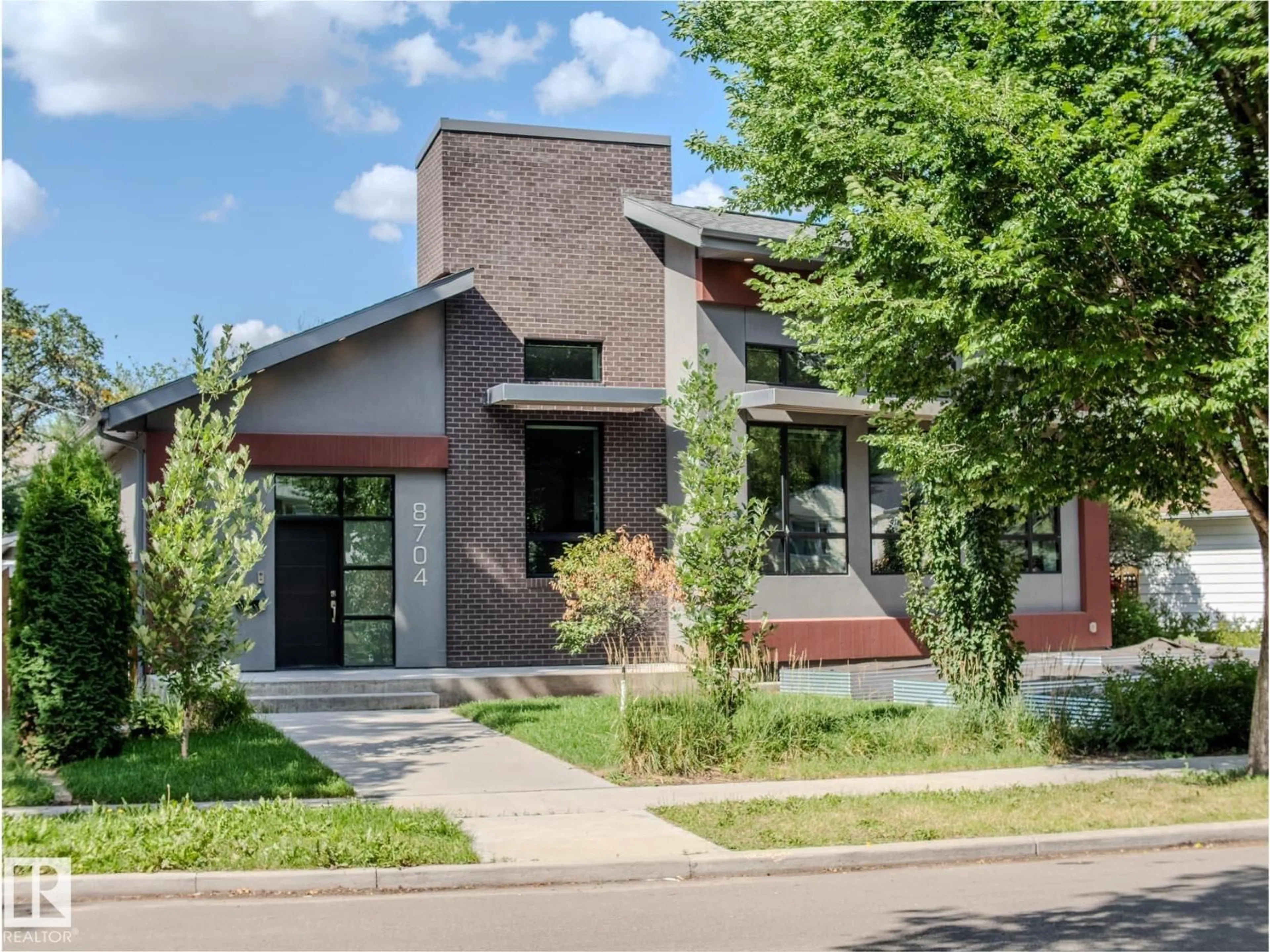 Home with brick exterior material, street for NW - 8704 92B AV, Edmonton Alberta T6C1S9