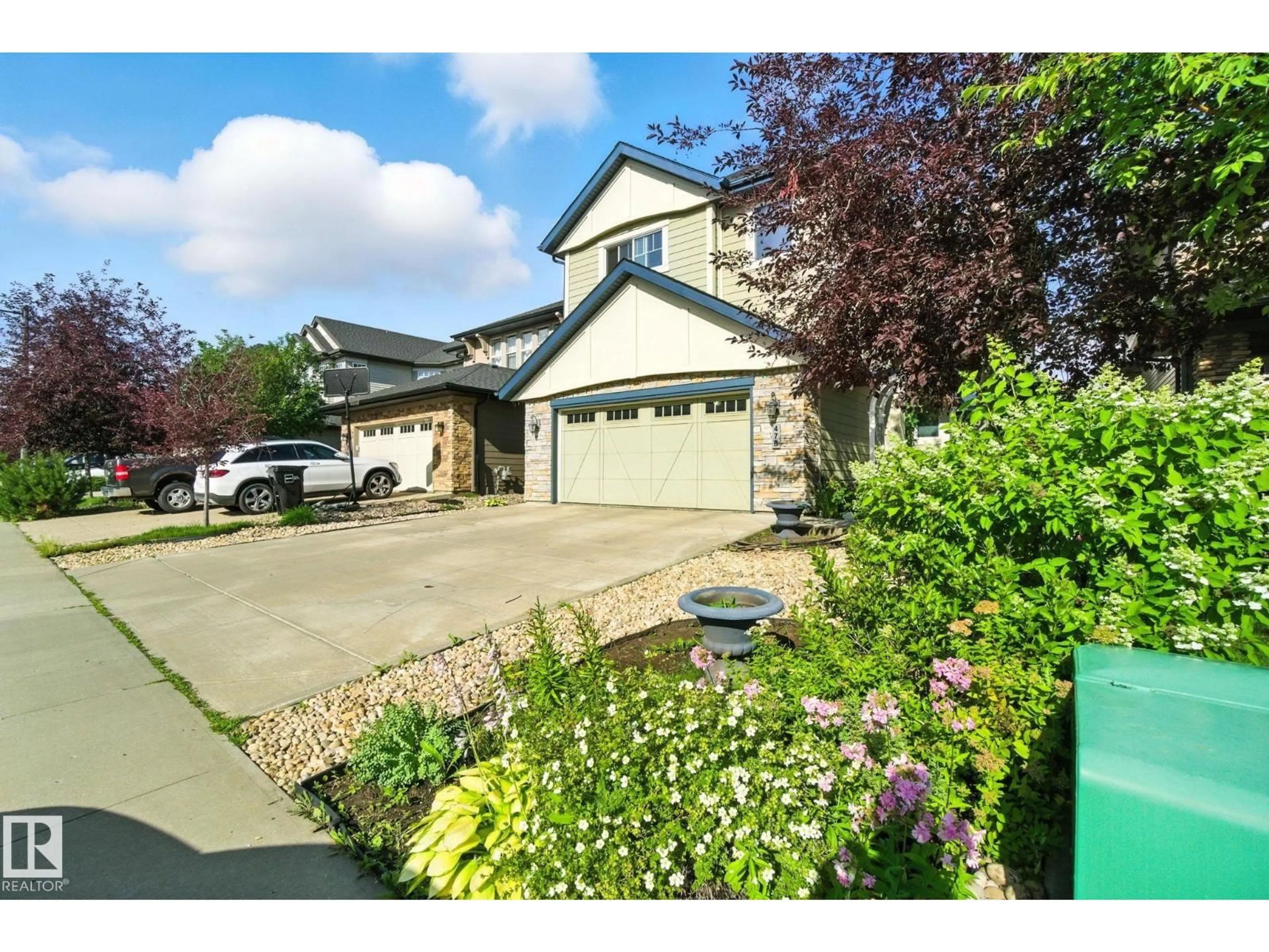 A pic from outside/outdoor area/front of a property/back of a property/a pic from drone, street for 478 AINSLIE CR, Edmonton Alberta T6W0H7