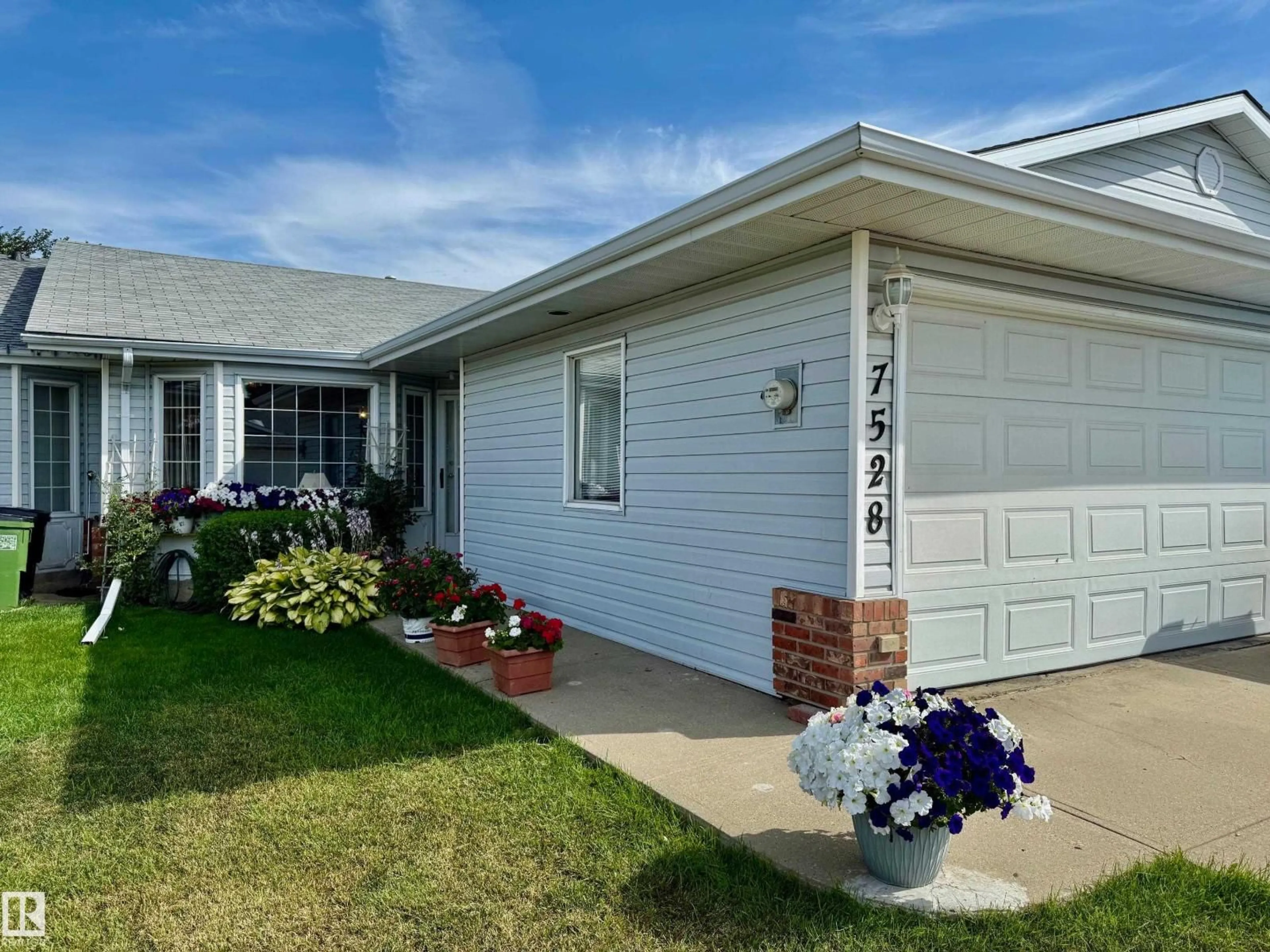 Home with vinyl exterior material, street for 7528 137A AV, Edmonton Alberta T5C3R4