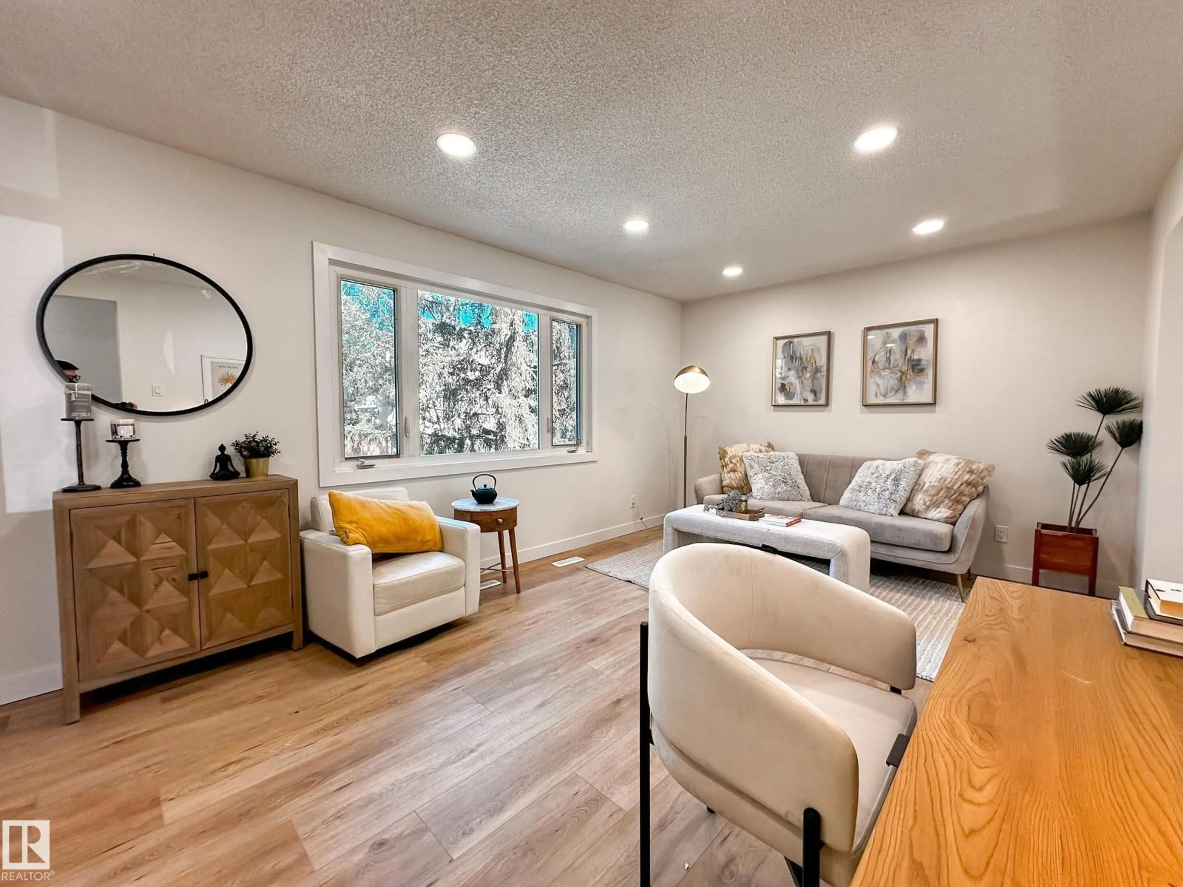 Living room with furniture, wood/laminate floor for J - 6 CALLINGWOOD CO, Edmonton Alberta T5T0H5