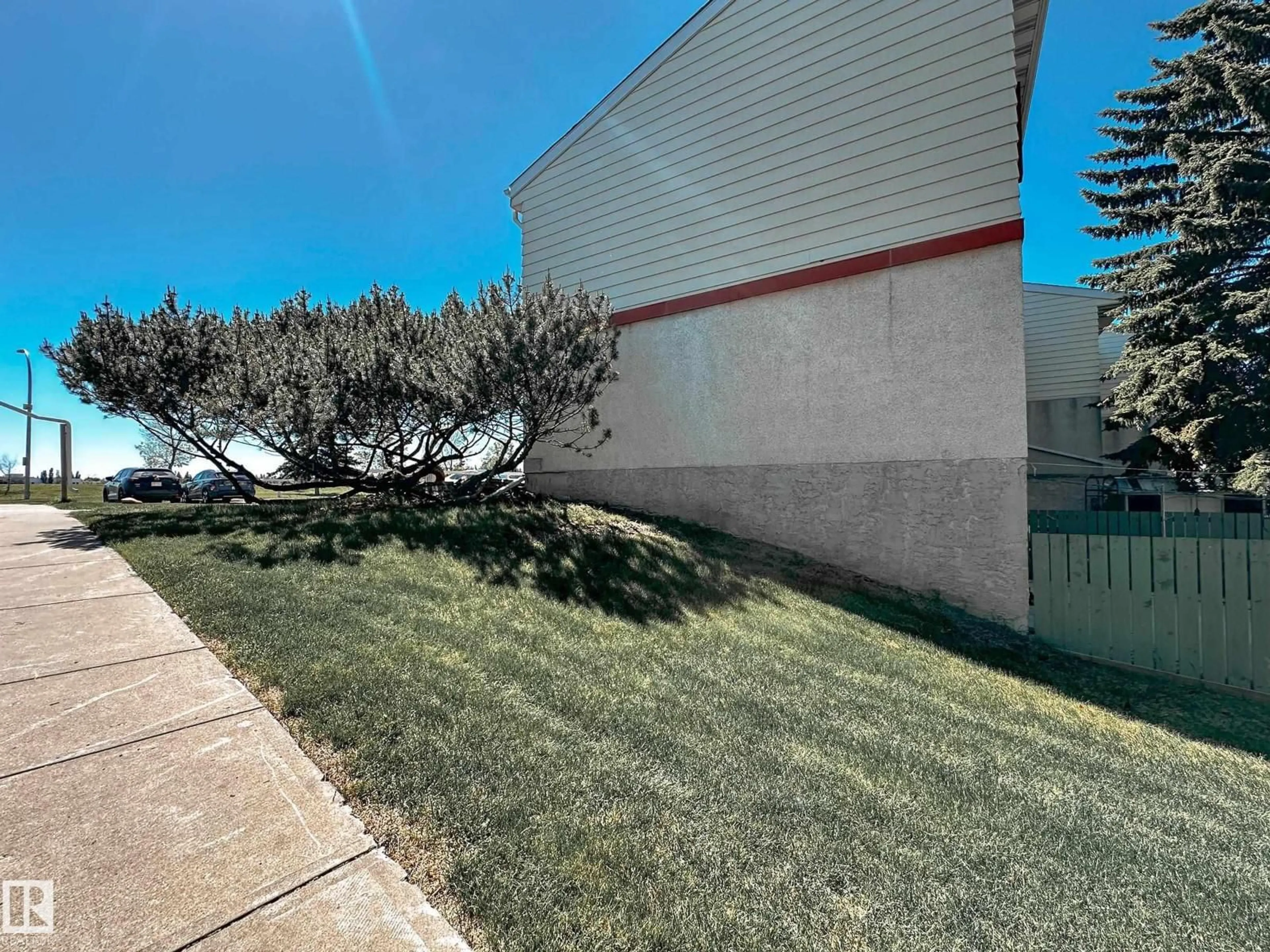 A pic from outside/outdoor area/front of a property/back of a property/a pic from drone, unknown for J - 6 CALLINGWOOD CO, Edmonton Alberta T5T0H5
