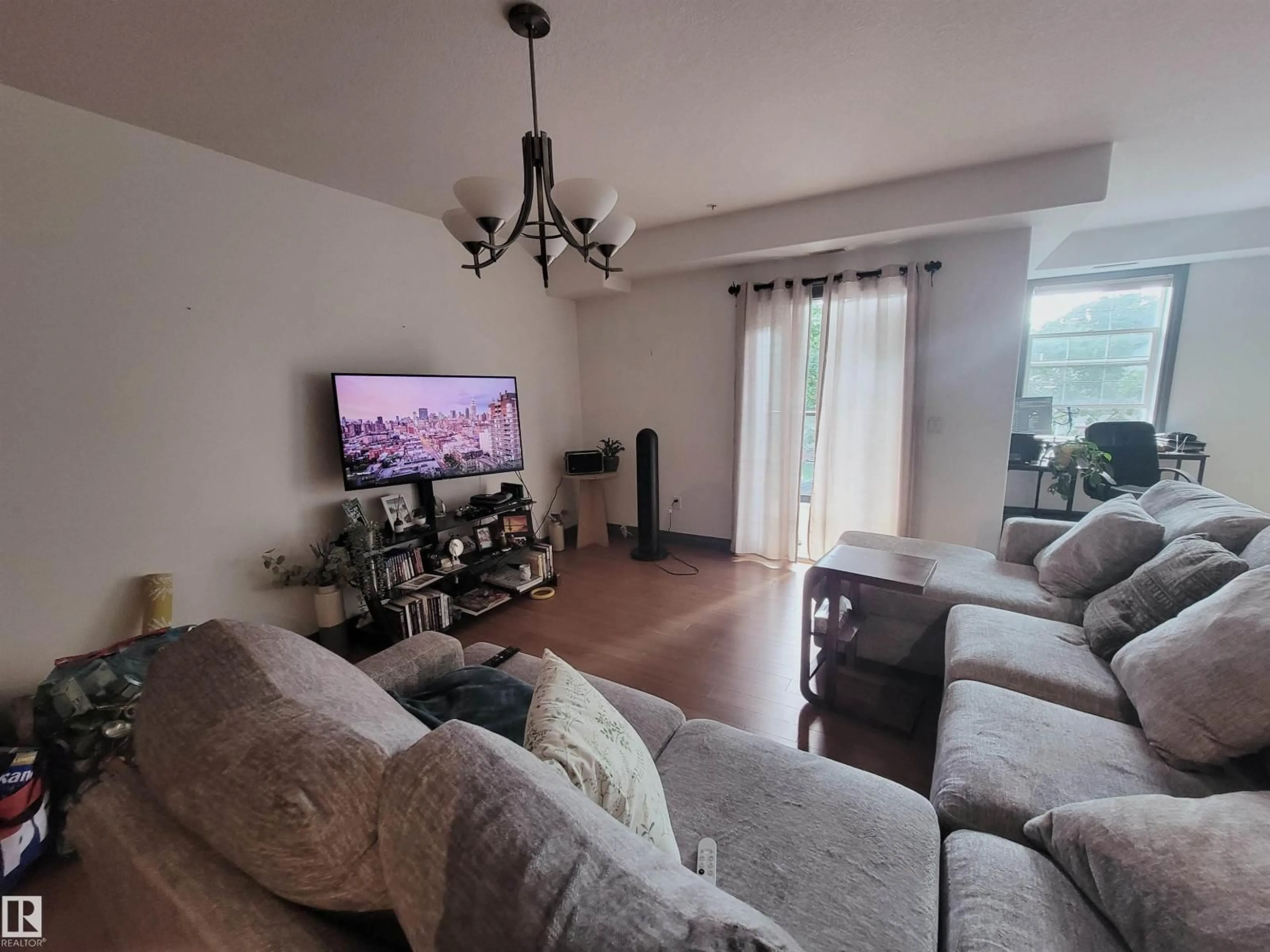 Living room with furniture, unknown for 207 - 9739 92 ST, Edmonton Alberta T6C3S3
