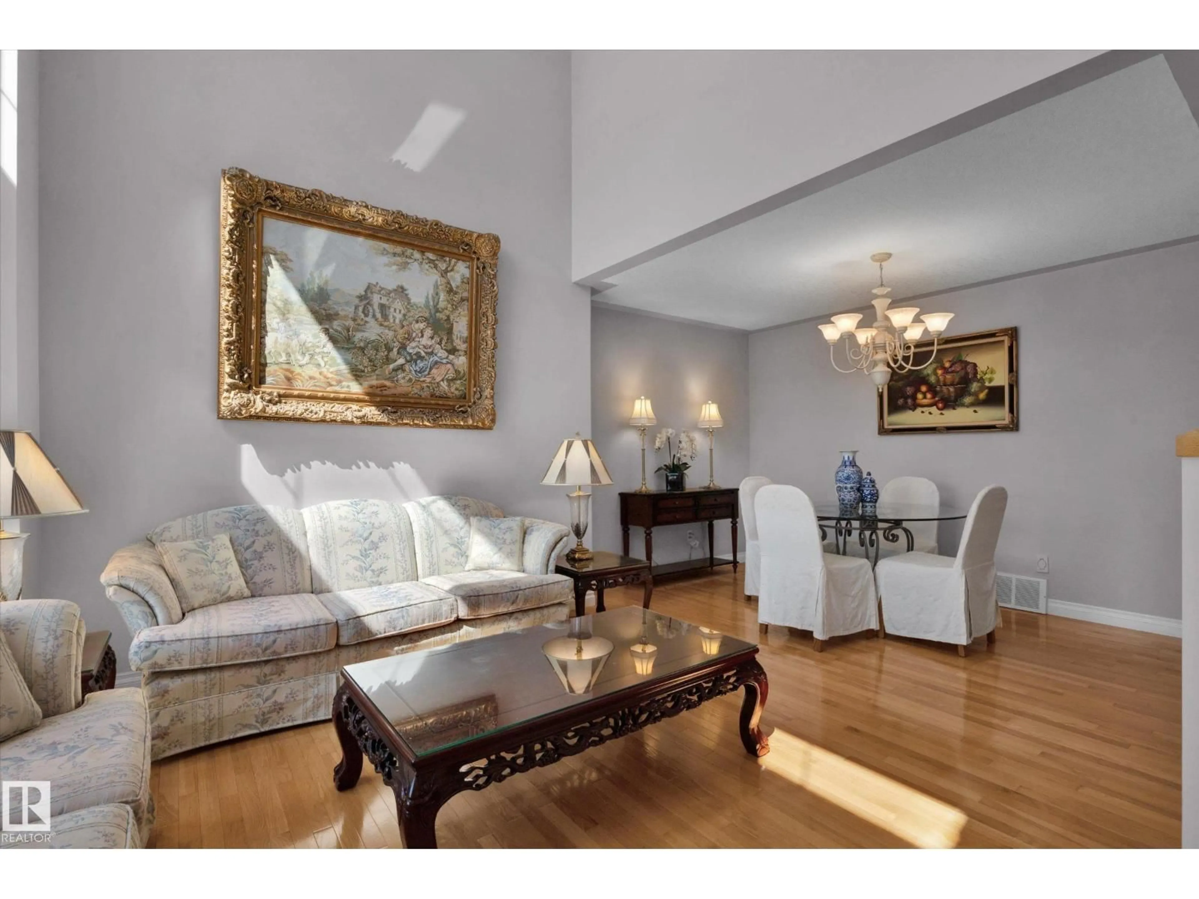 Living room with furniture, wood/laminate floor for 11820 13 AV, Edmonton Alberta T6J7E9