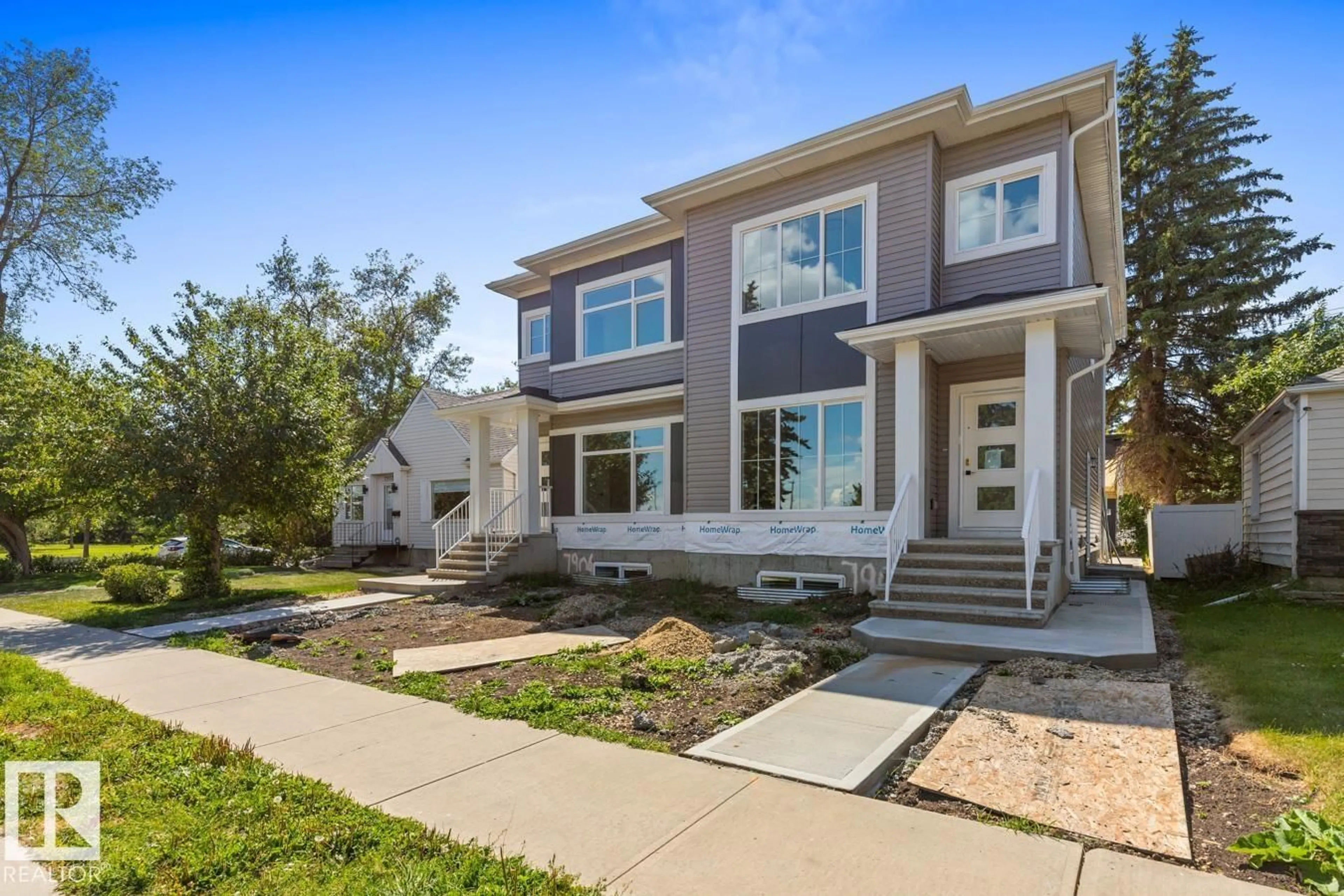 Home with vinyl exterior material, street for 7908 75 ST, Edmonton Alberta T6C2G5