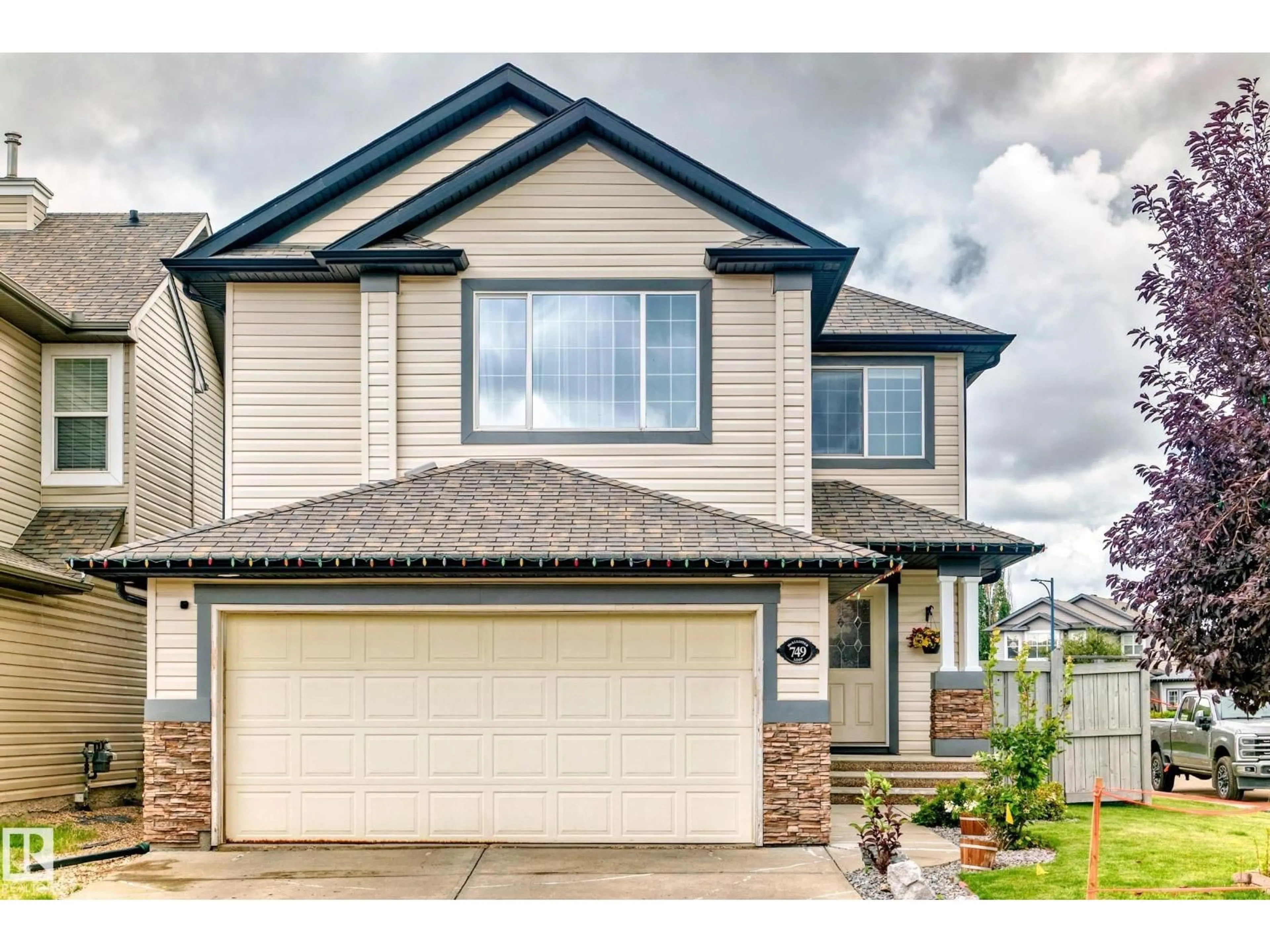 Home with vinyl exterior material, street for SW - 749 MCALLISTER LO, Edmonton Alberta T6W1R5