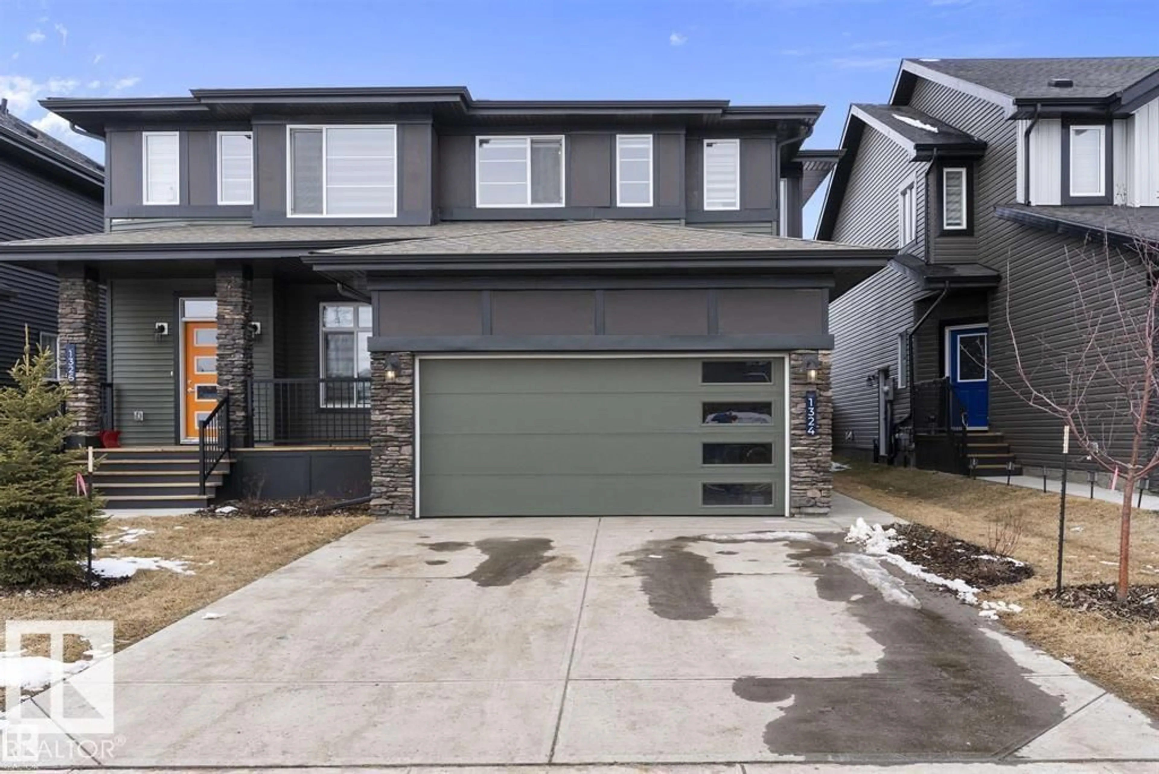 Home with brick exterior material, street for NW - 1324 SISKIN WD, Edmonton Alberta T5S0P9