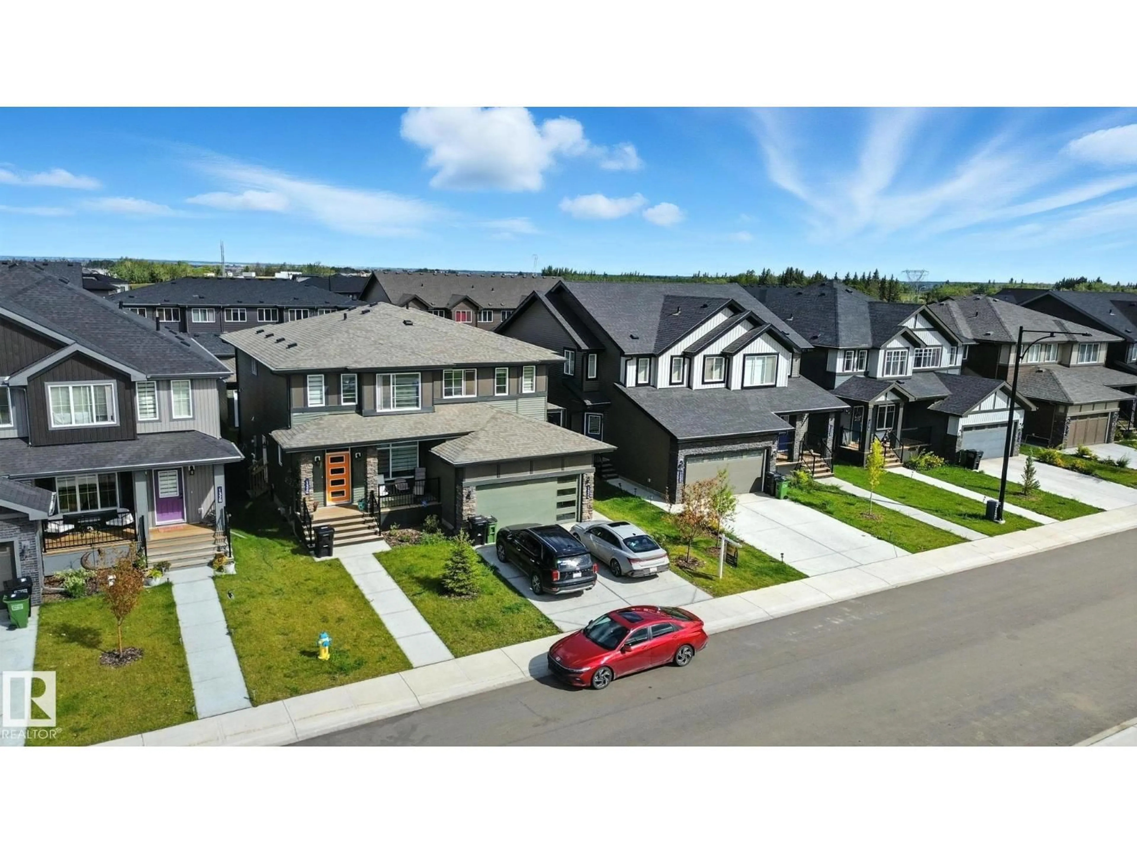 A pic from outside/outdoor area/front of a property/back of a property/a pic from drone, street for NW - 1324 SISKIN WD, Edmonton Alberta T5S0P9