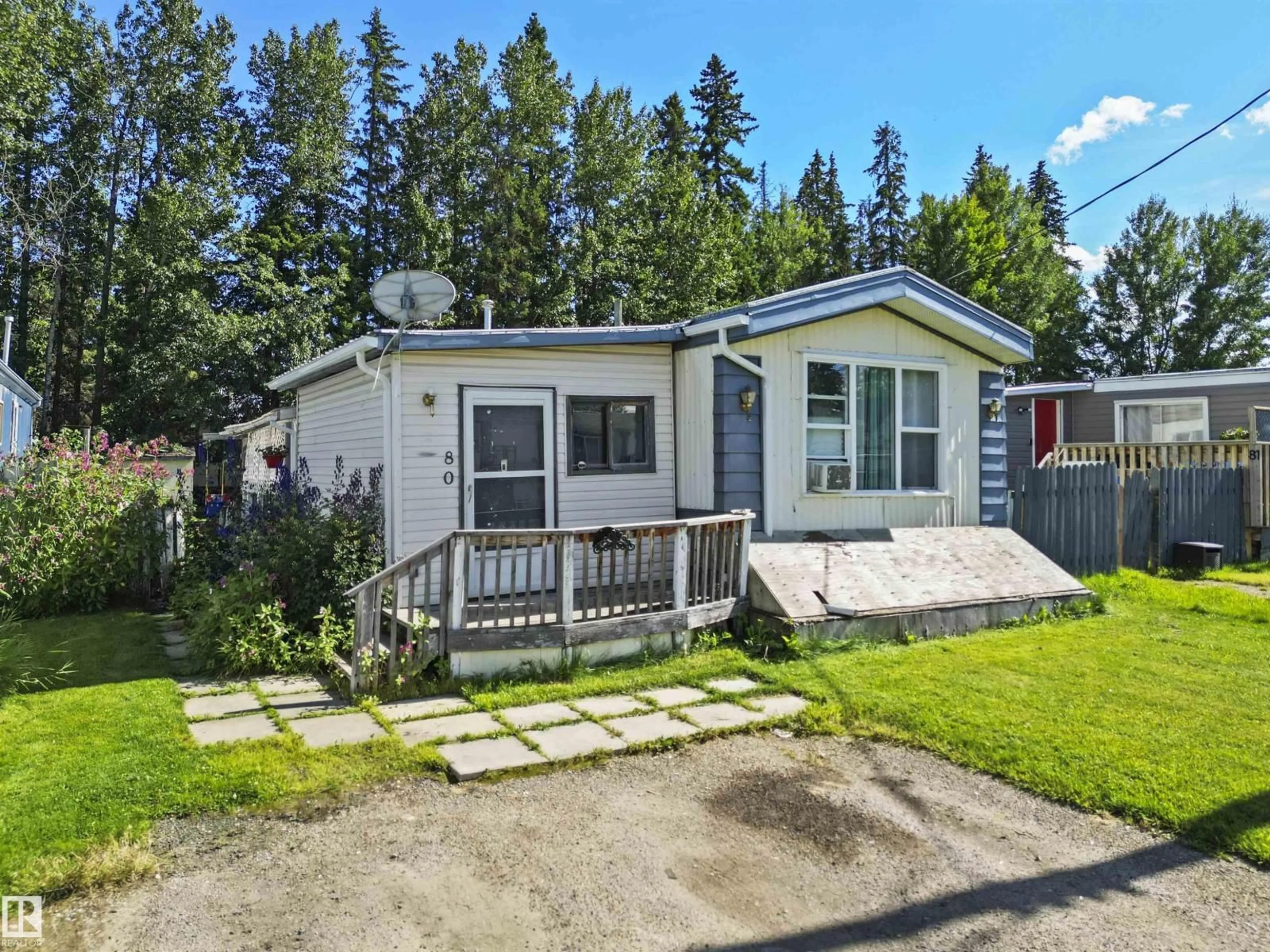 A pic from outside/outdoor area/front of a property/back of a property/a pic from drone, street for #80 - 5644 50 STREET, Drayton Valley Alberta T7A1L4