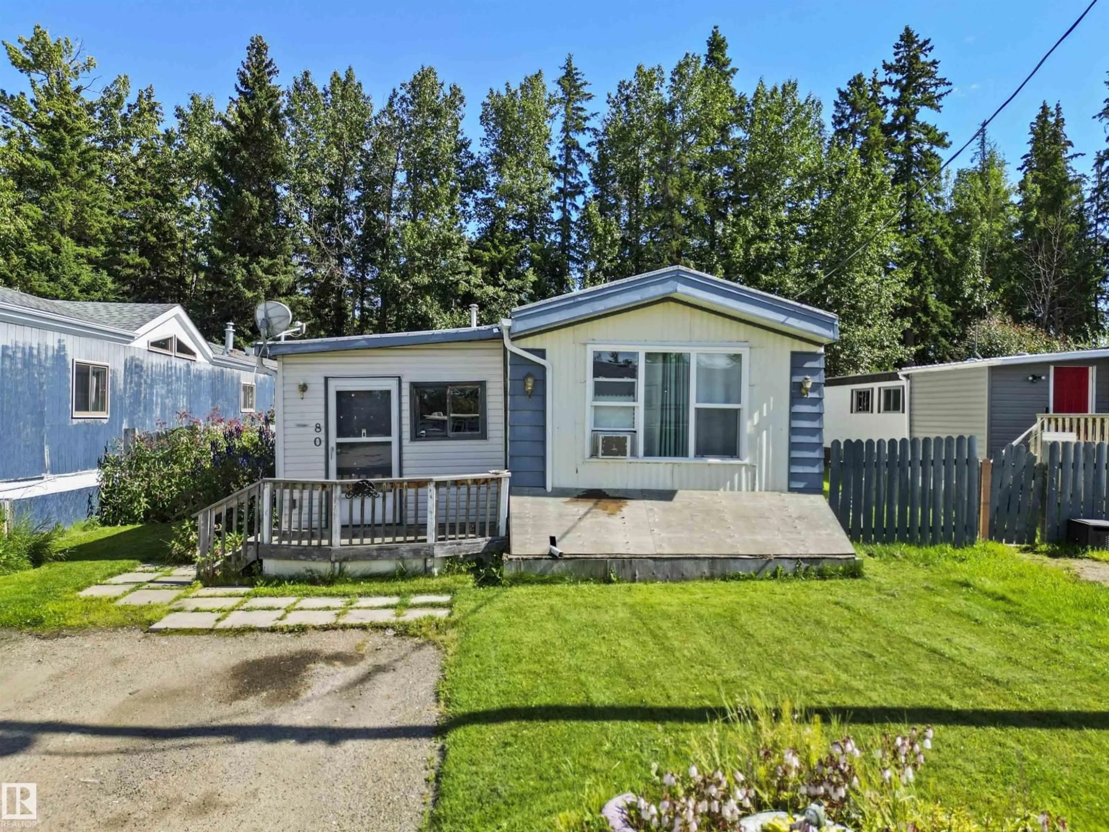 Home with vinyl exterior material, street for #80 - 5644 50 STREET, Drayton Valley Alberta T7A1L4