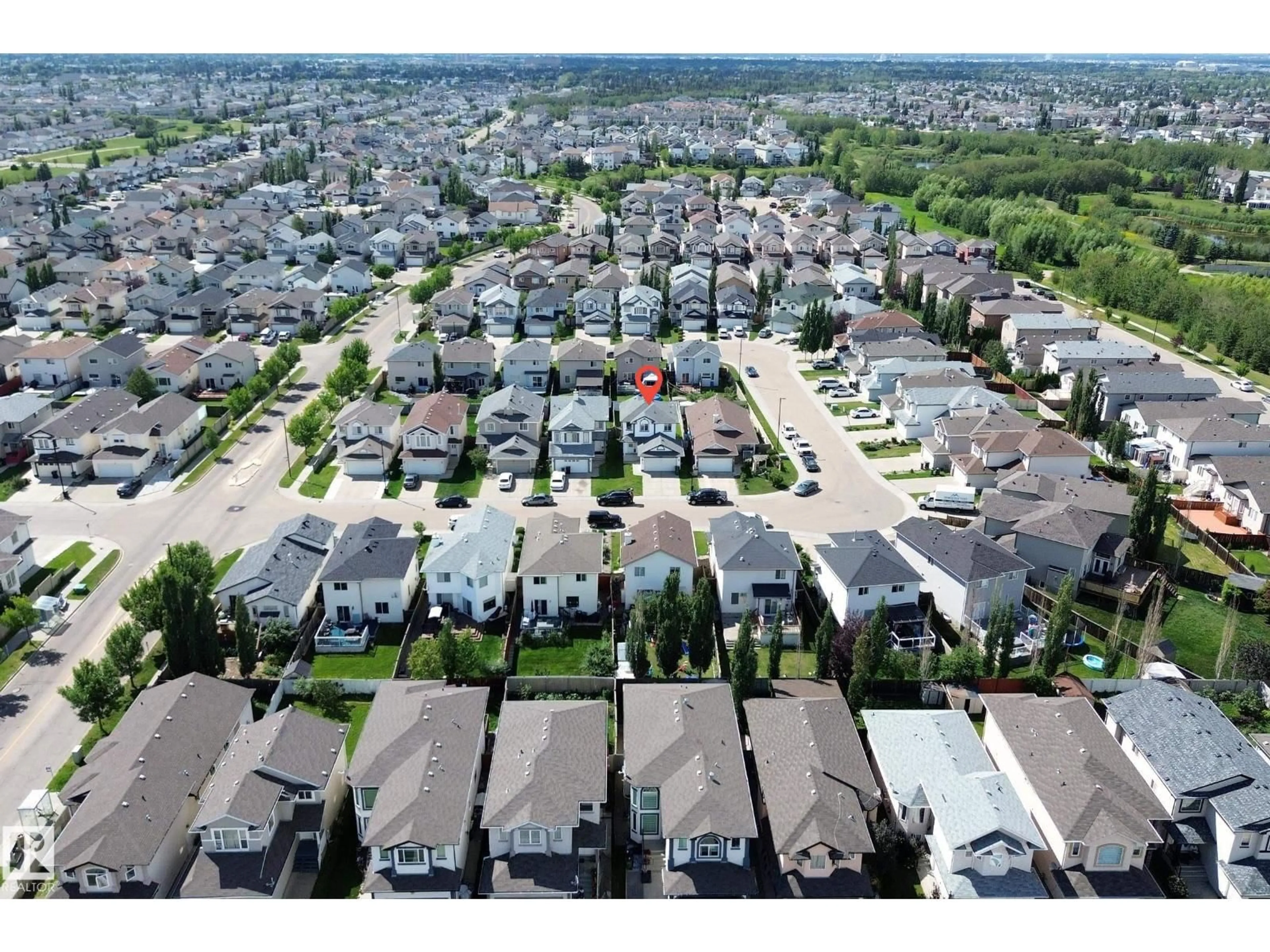 A pic from outside/outdoor area/front of a property/back of a property/a pic from drone, street for 3320 20 ST, Edmonton Alberta T6T0L5