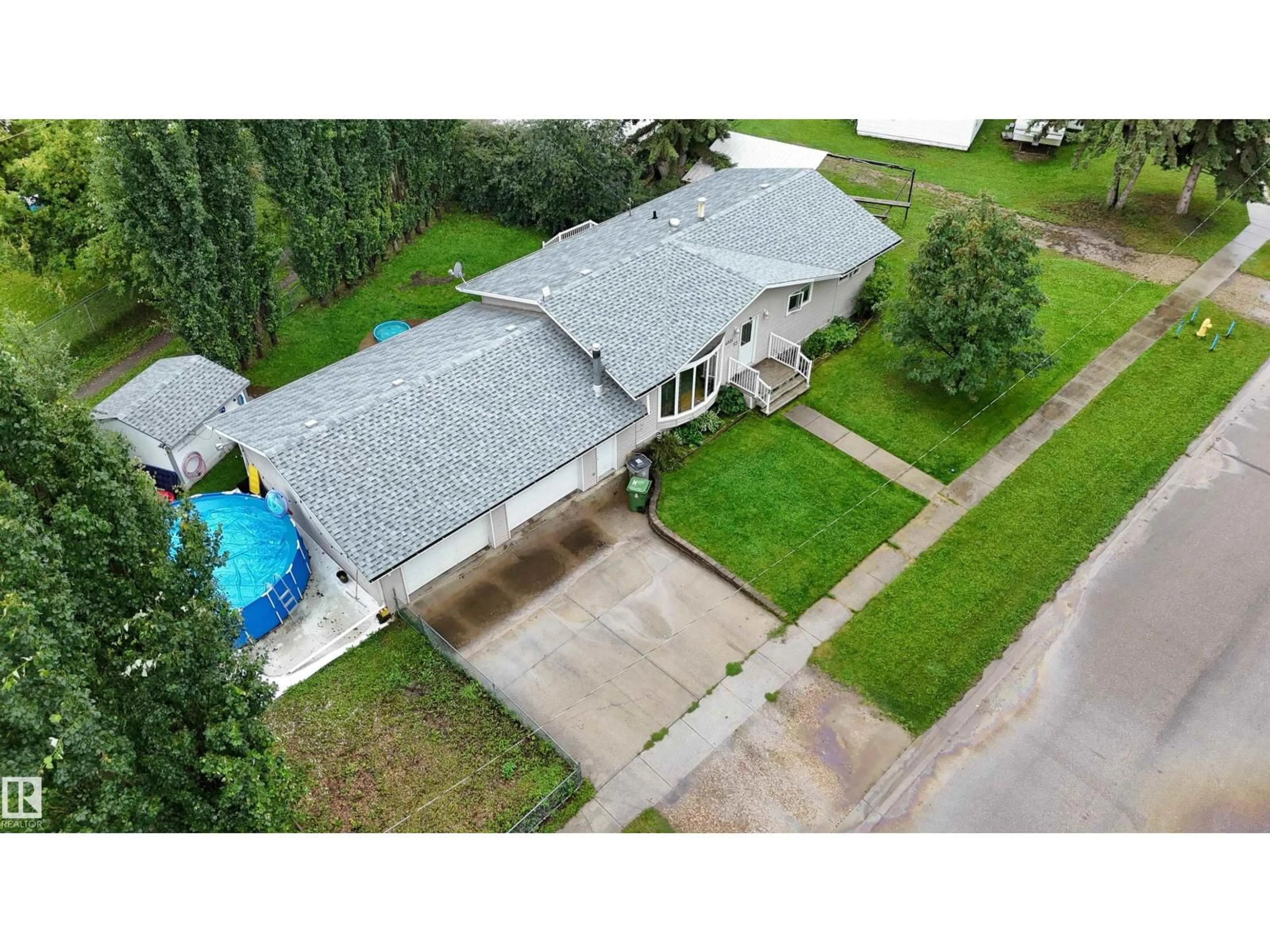 A pic from outside/outdoor area/front of a property/back of a property/a pic from drone, street for 4811 53RD AV, Breton Alberta T0C0P0