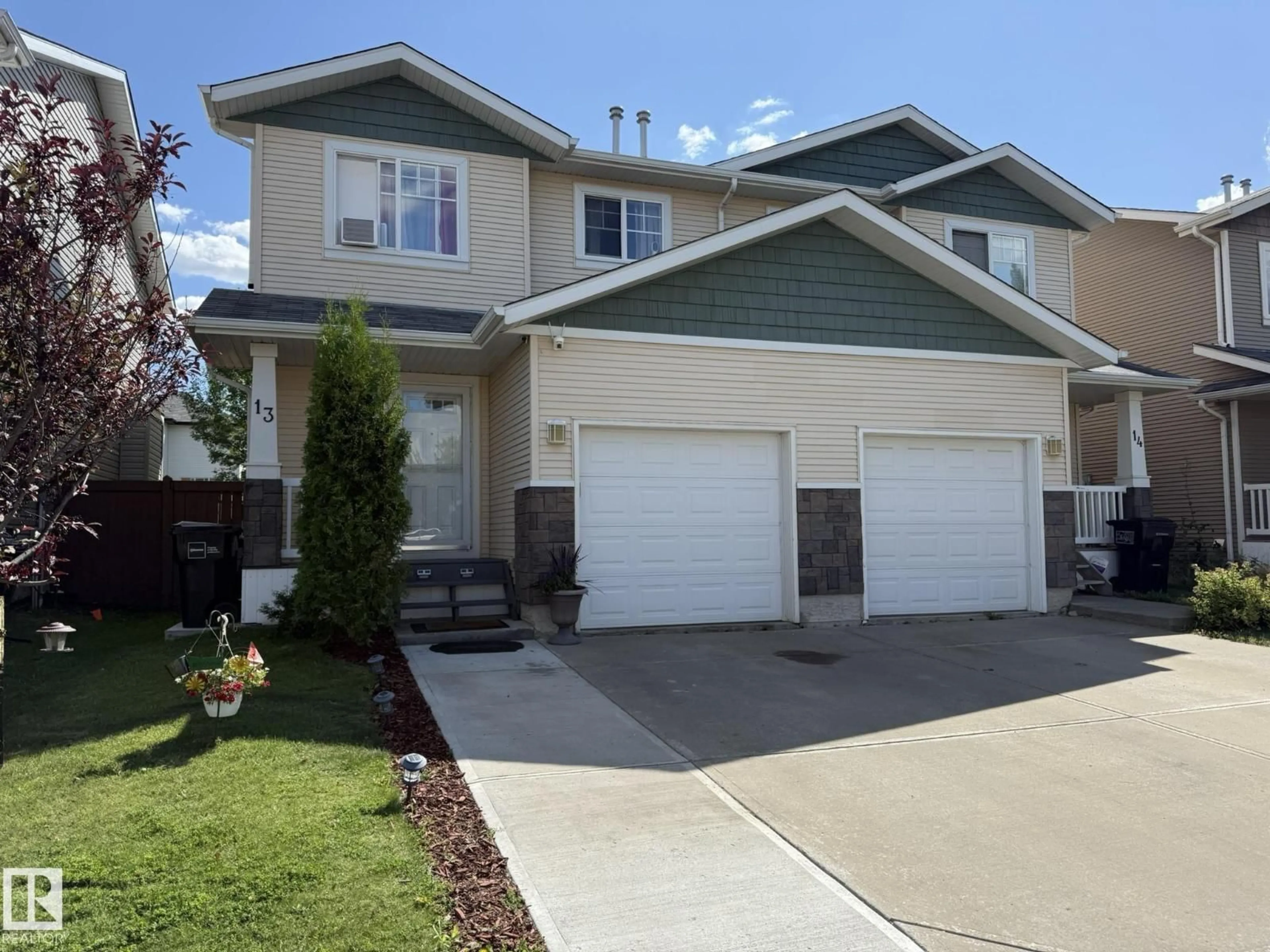 Home with vinyl exterior material, street for 13 - 14208 36 ST, Edmonton Alberta T5Y0E4