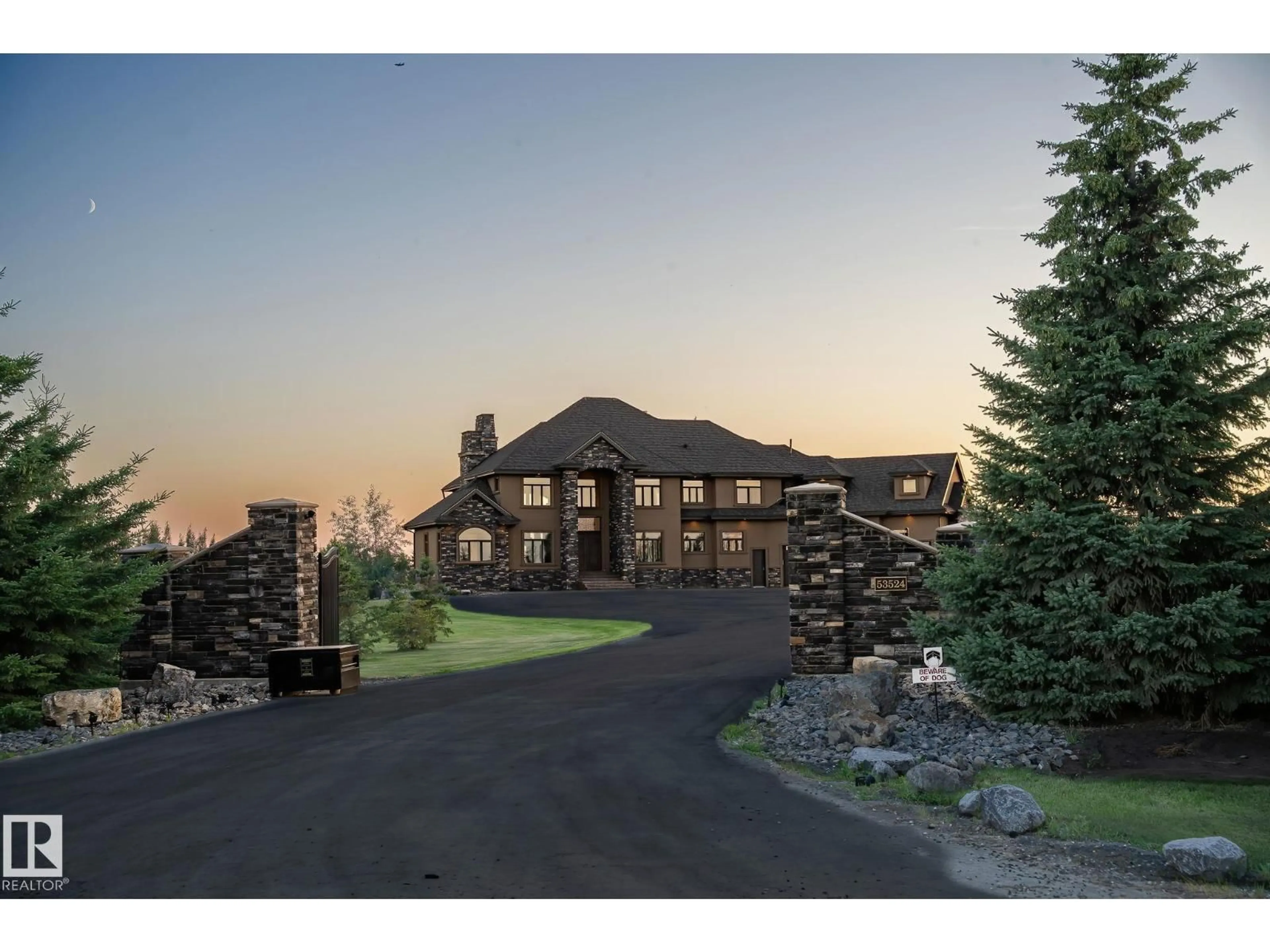 A pic from outside/outdoor area/front of a property/back of a property/a pic from drone, mountain view for 53524 RGE ROAD 263 A, Rural Sturgeon County Alberta T8T1C8