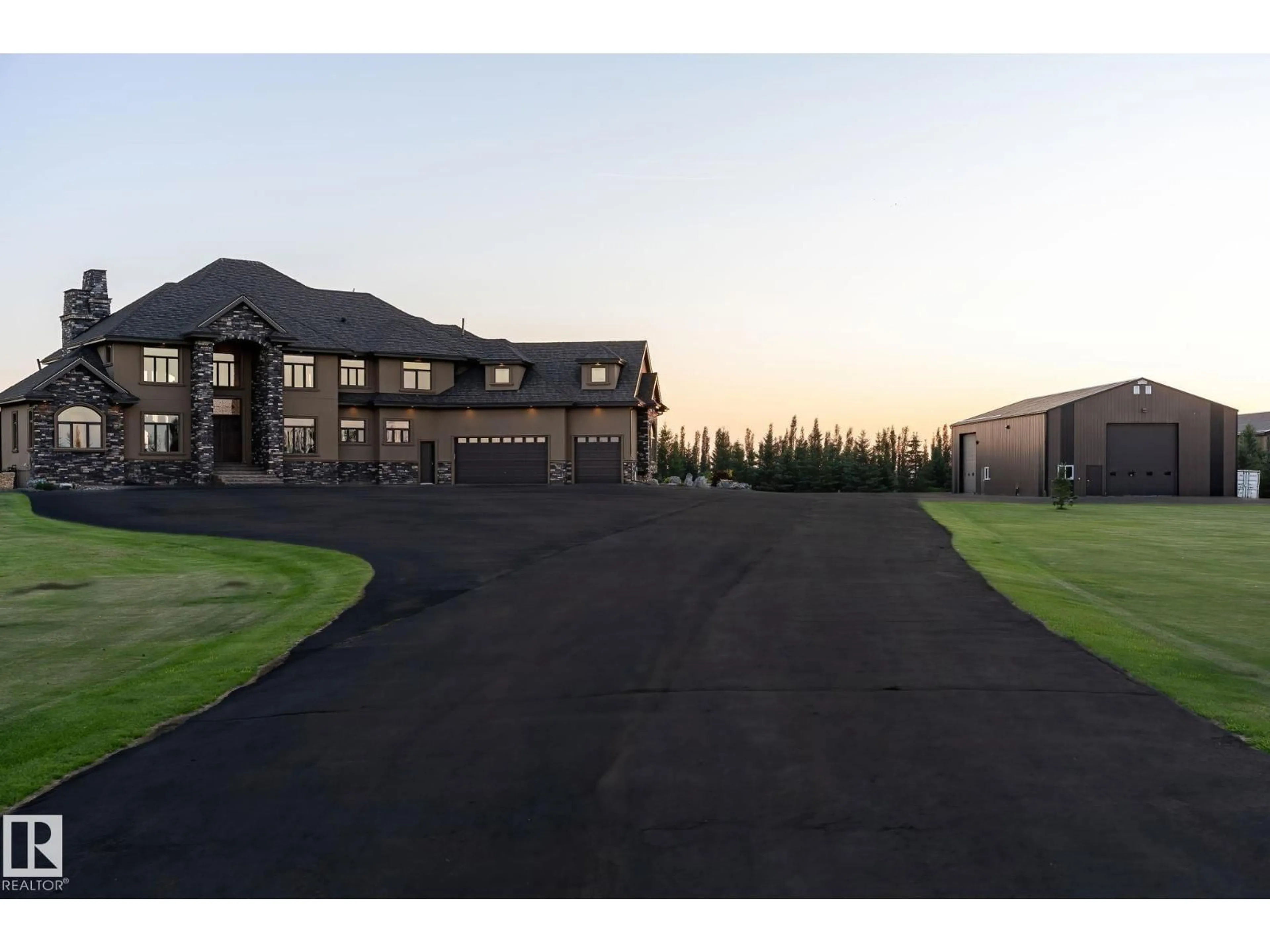 A pic from outside/outdoor area/front of a property/back of a property/a pic from drone, mountain view for 53524 RGE ROAD 263 A, Rural Sturgeon County Alberta T8T1C8