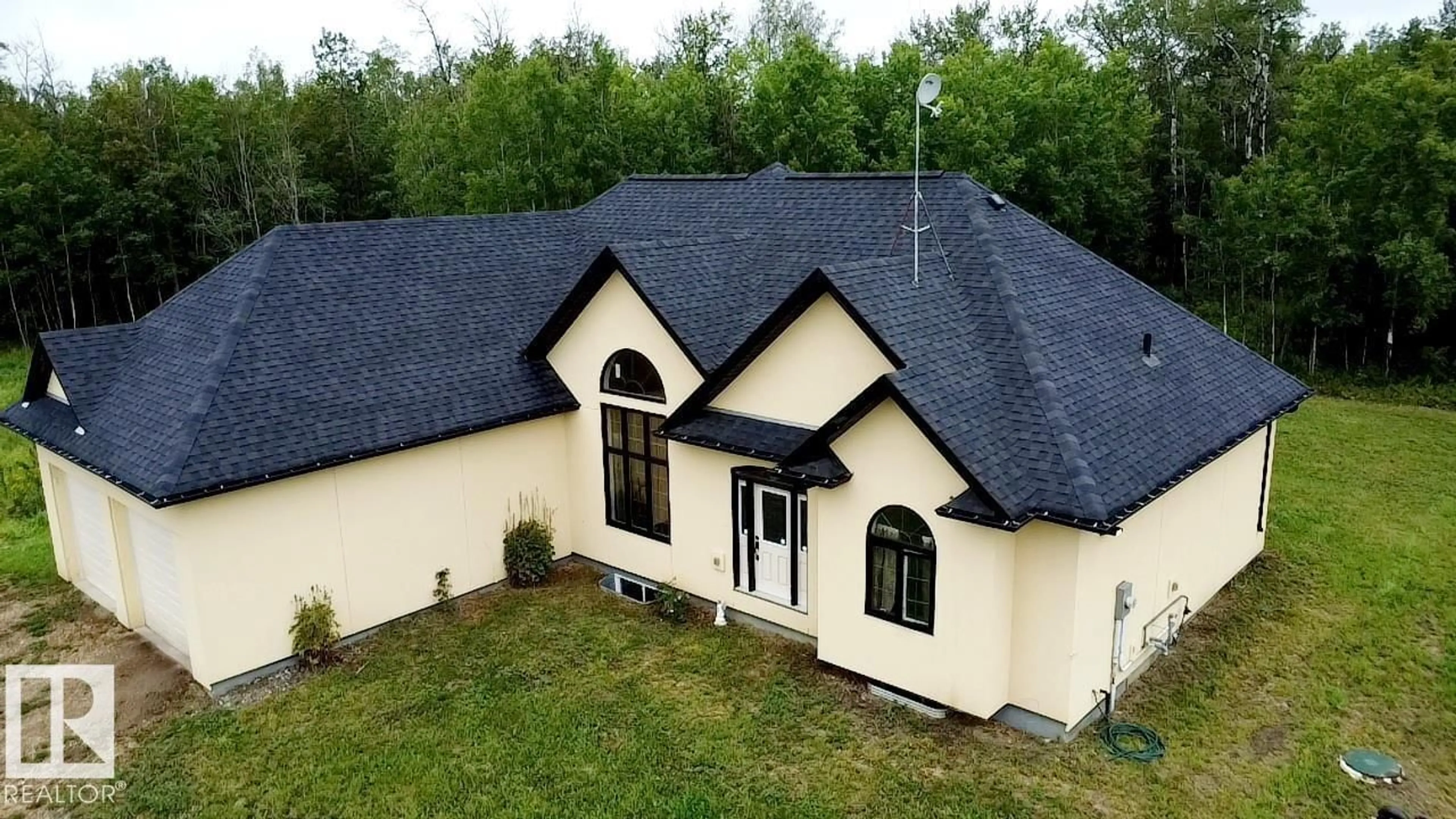 A pic from outside/outdoor area/front of a property/back of a property/a pic from drone, building for 20322 TWP ROAD 515, Rural Strathcona County Alberta T8G1G2
