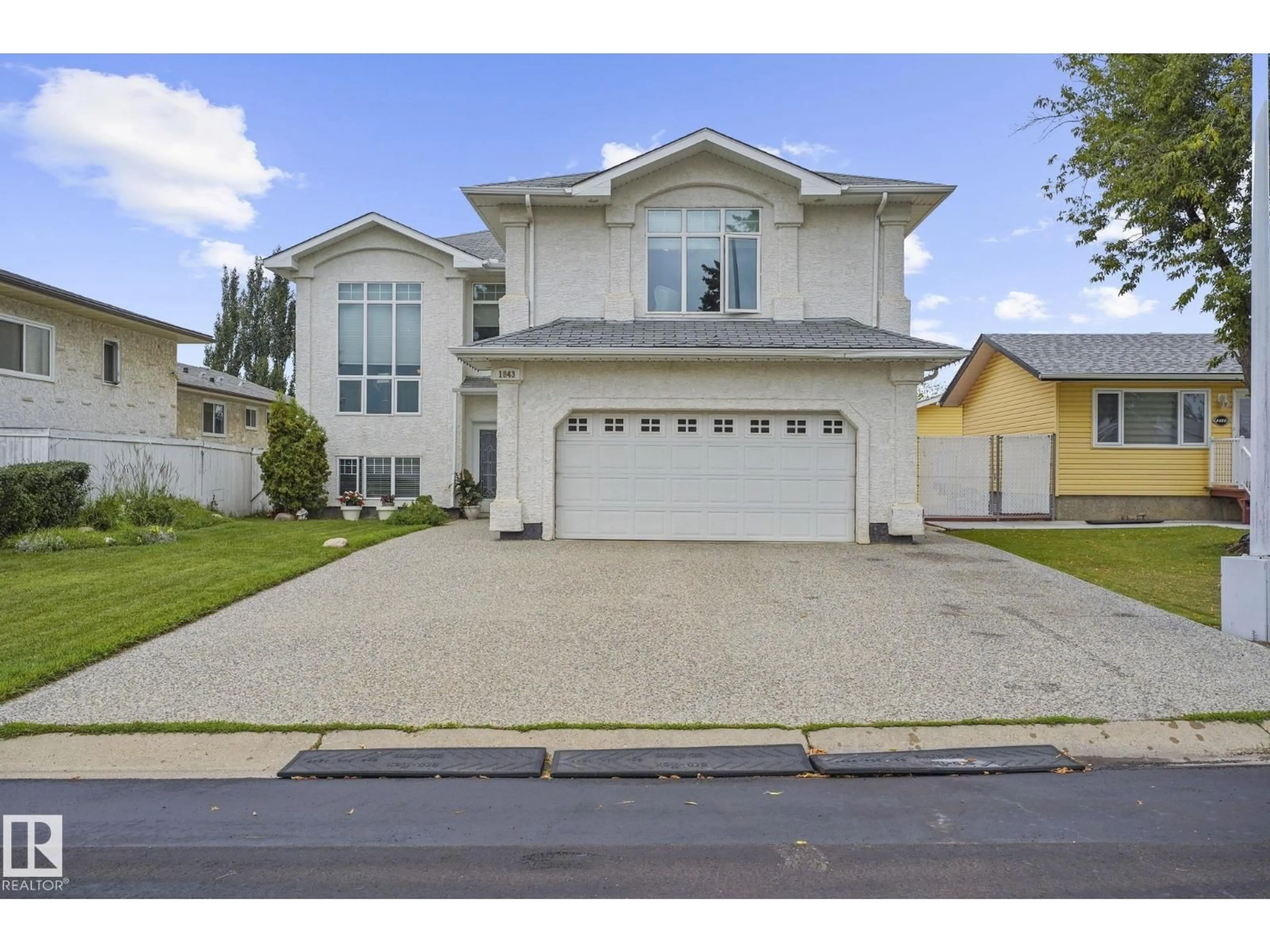 Home with vinyl exterior material, street for NW - 1843 45 ST, Edmonton Alberta T6L2S6