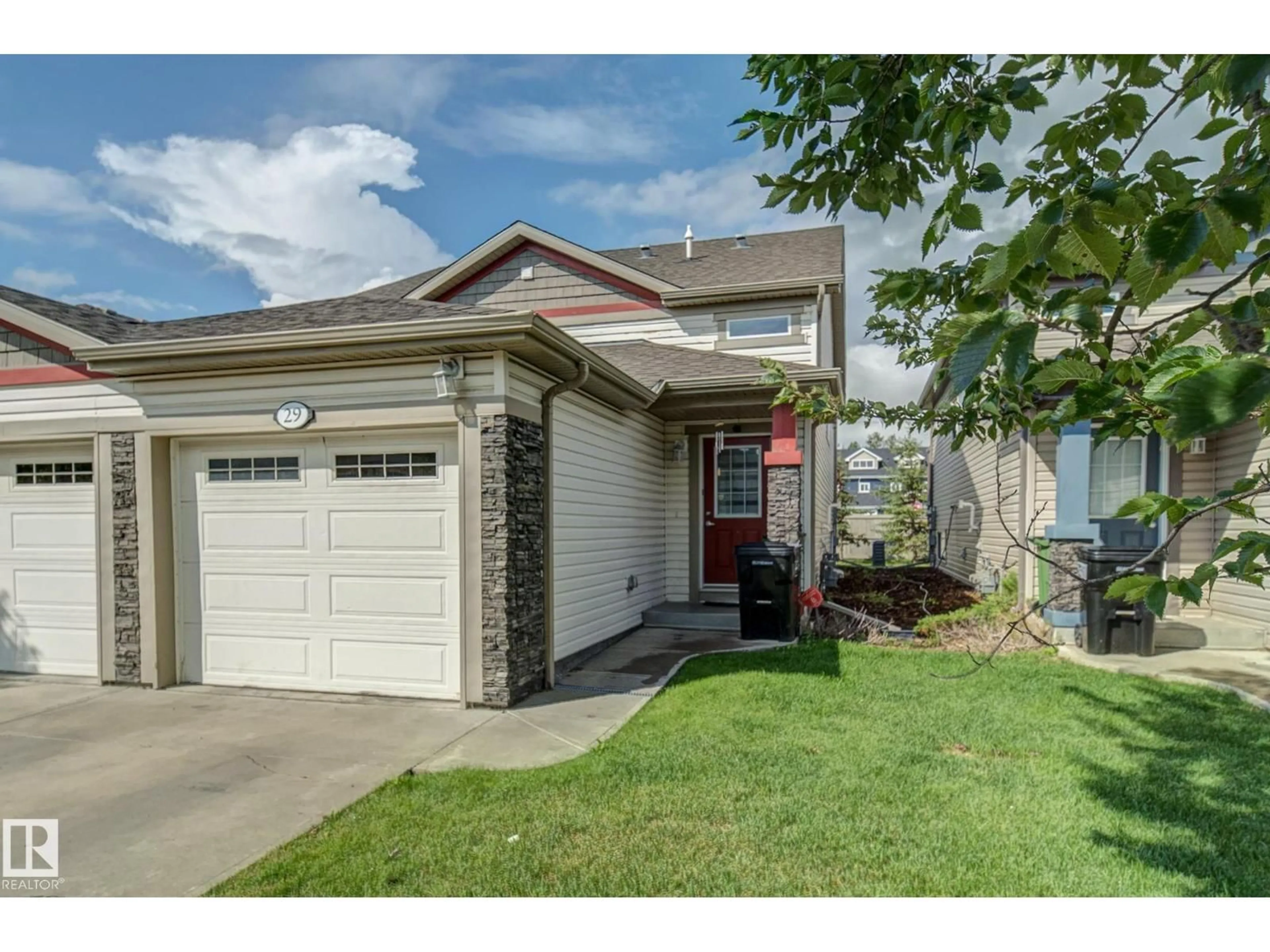 Home with vinyl exterior material, street for #29 - 6520 2 AV SW, Edmonton Alberta T6S1S4