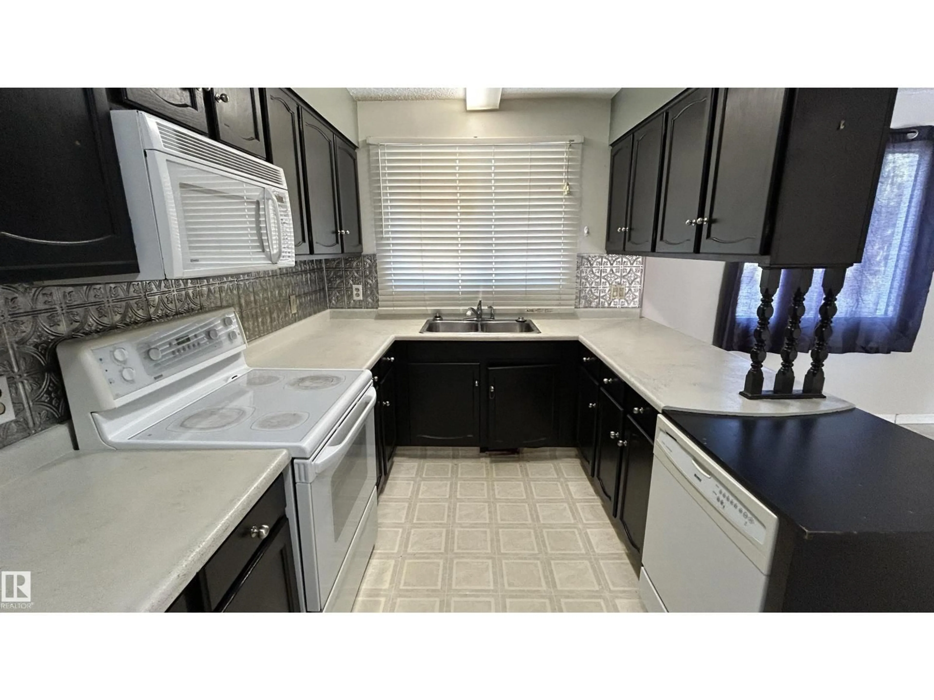 Standard kitchen, ceramic/tile floor for 4819 49 ST, Glendon Alberta T0A1P0