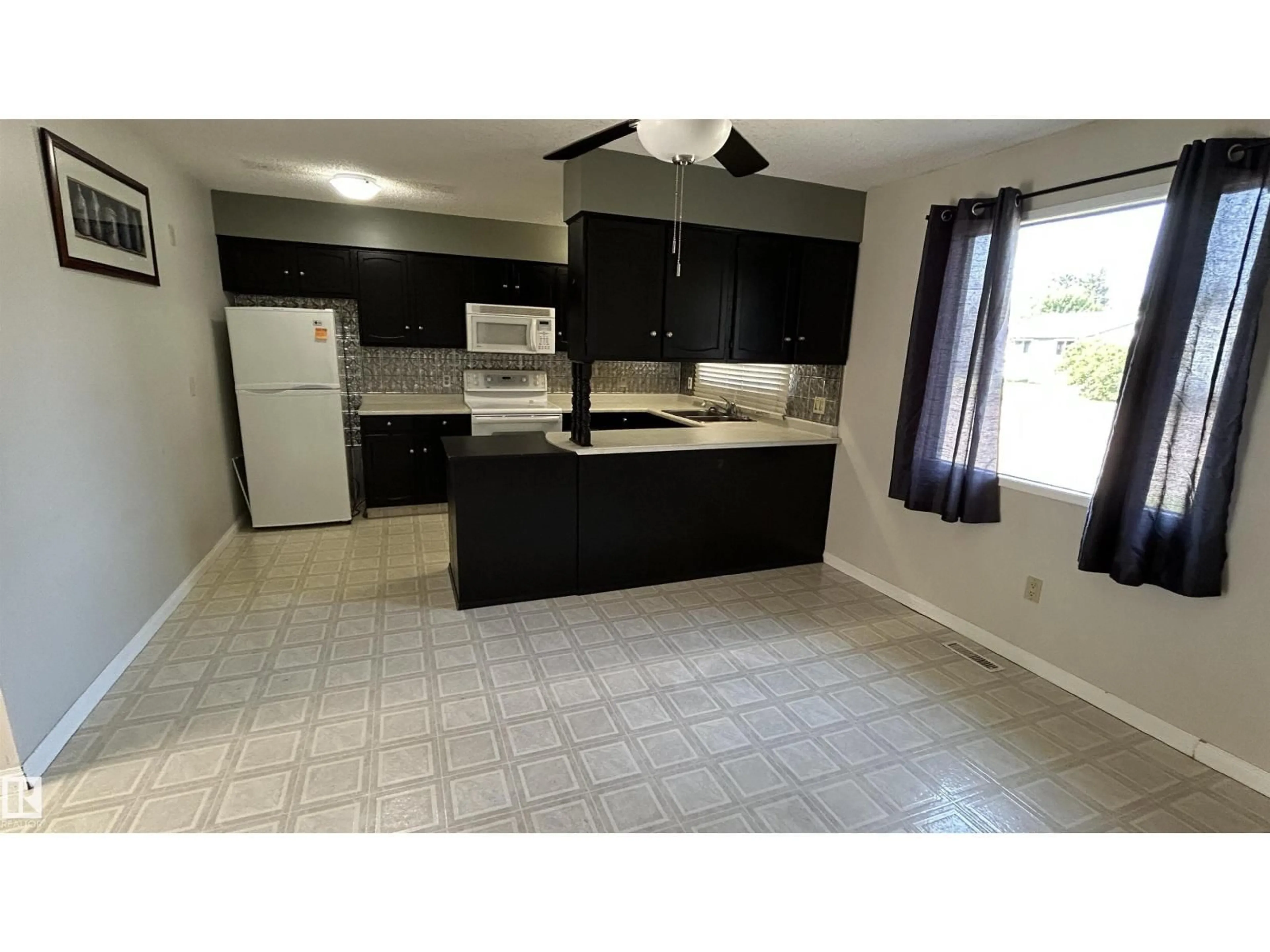 Standard kitchen, ceramic/tile floor for 4819 49 ST, Glendon Alberta T0A1P0