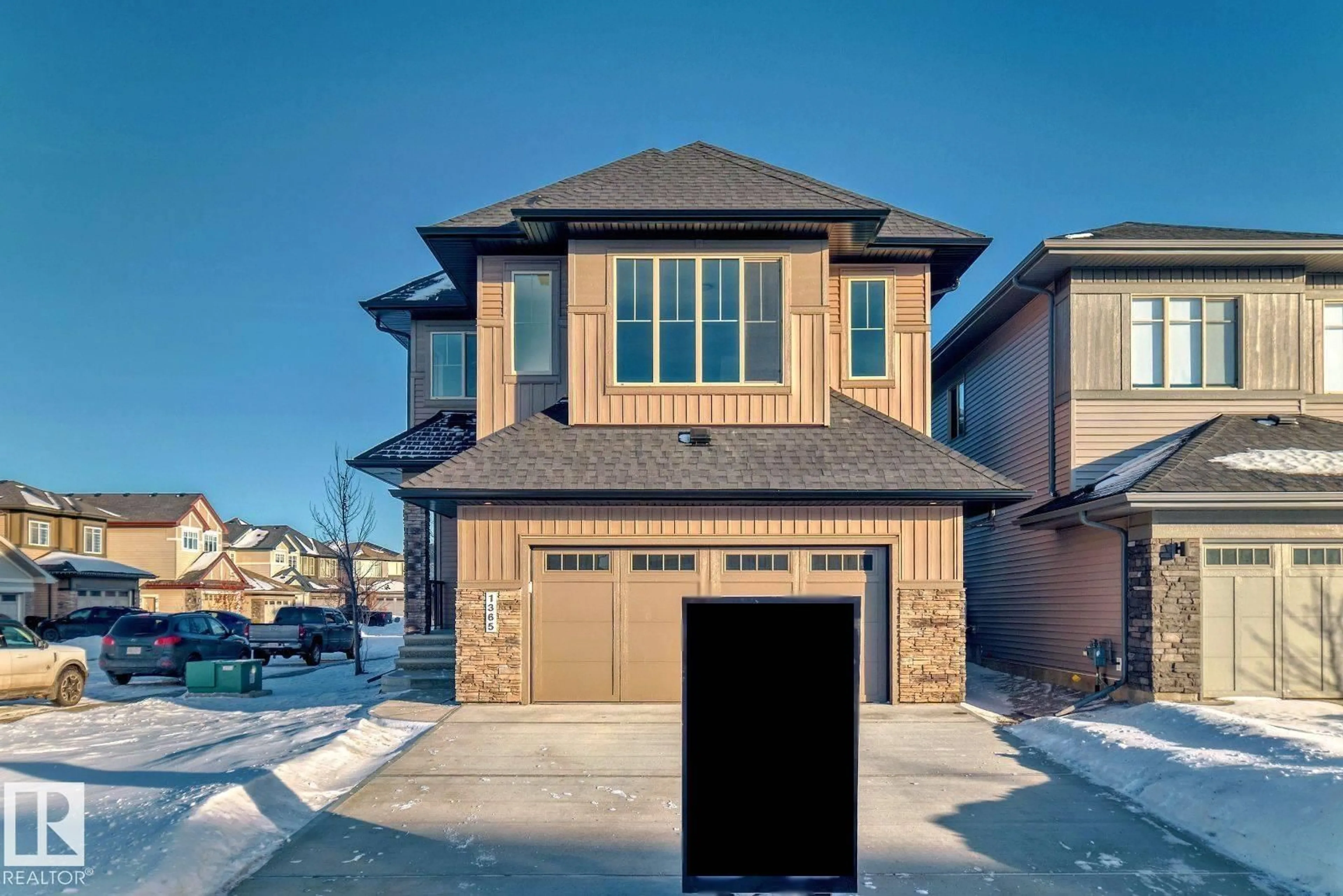 Home with brick exterior material, street for 1365 AINSLIE WD, Edmonton Alberta T6W3E9
