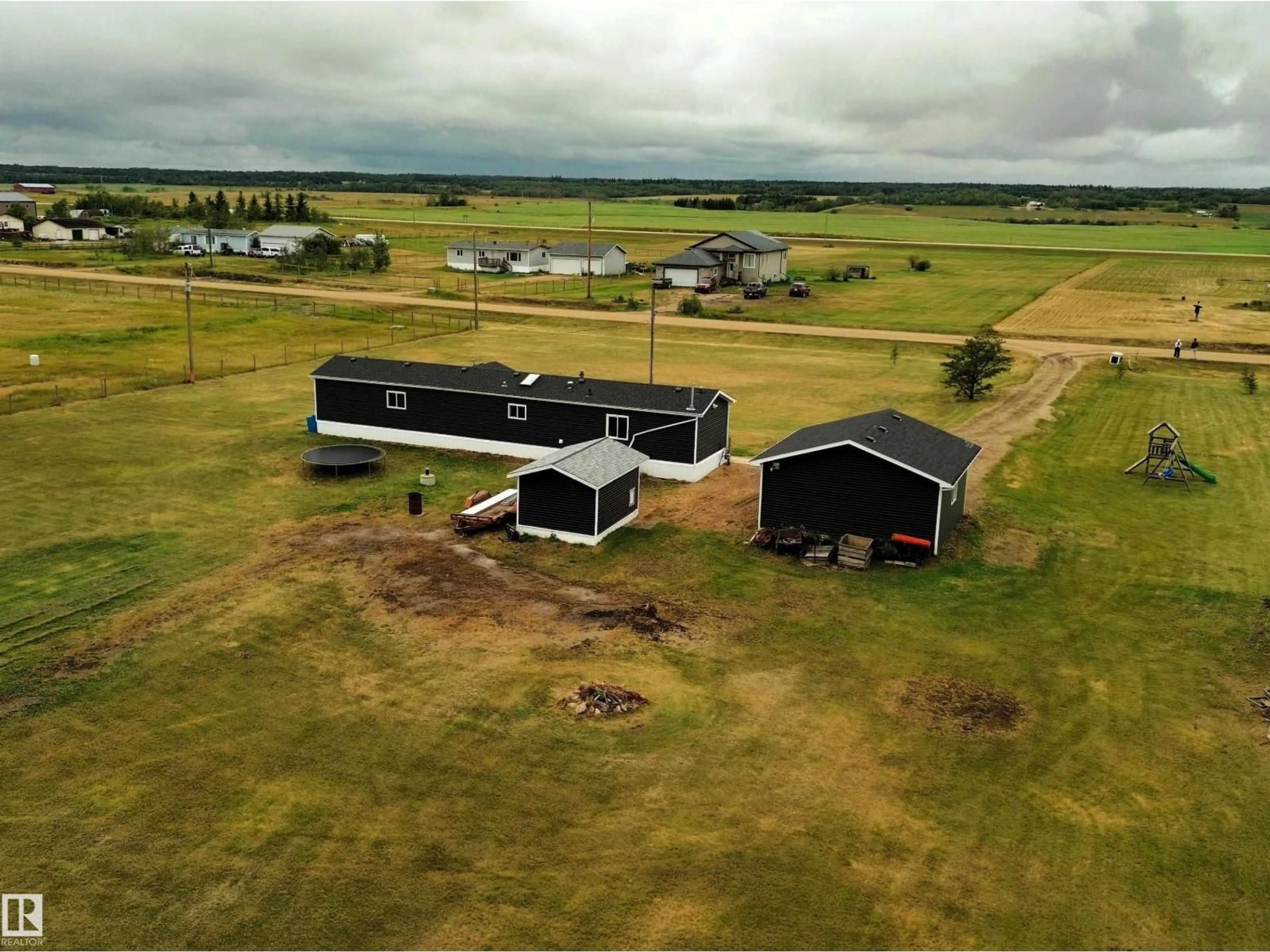 A pic from outside/outdoor area/front of a property/back of a property/a pic from drone, building for 42 RICHFIELD RD, Rural Sturgeon County Alberta T0G1L2