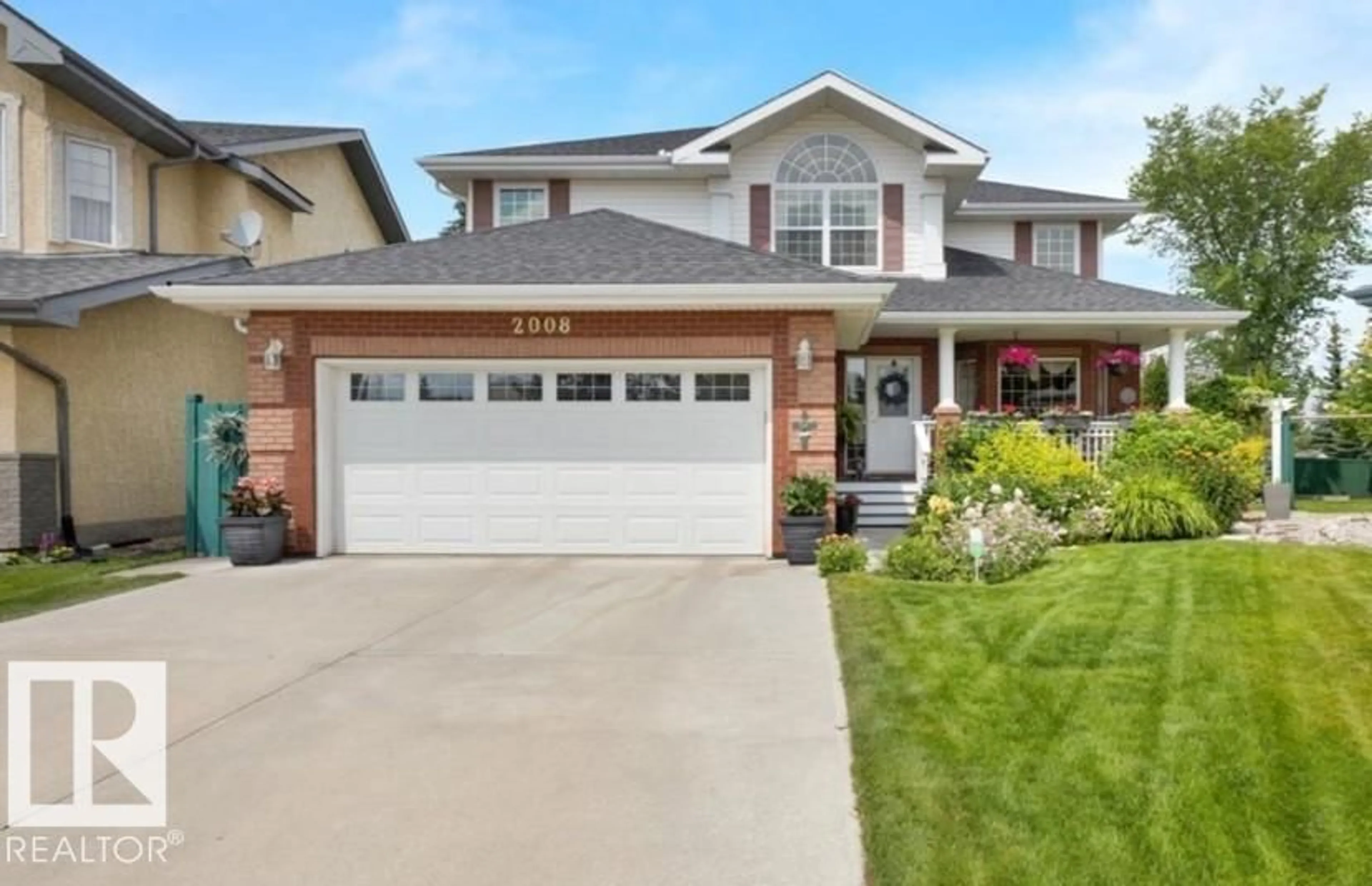 Home with vinyl exterior material, street for 2008 HADDOW DR, Edmonton Alberta T6R2P2