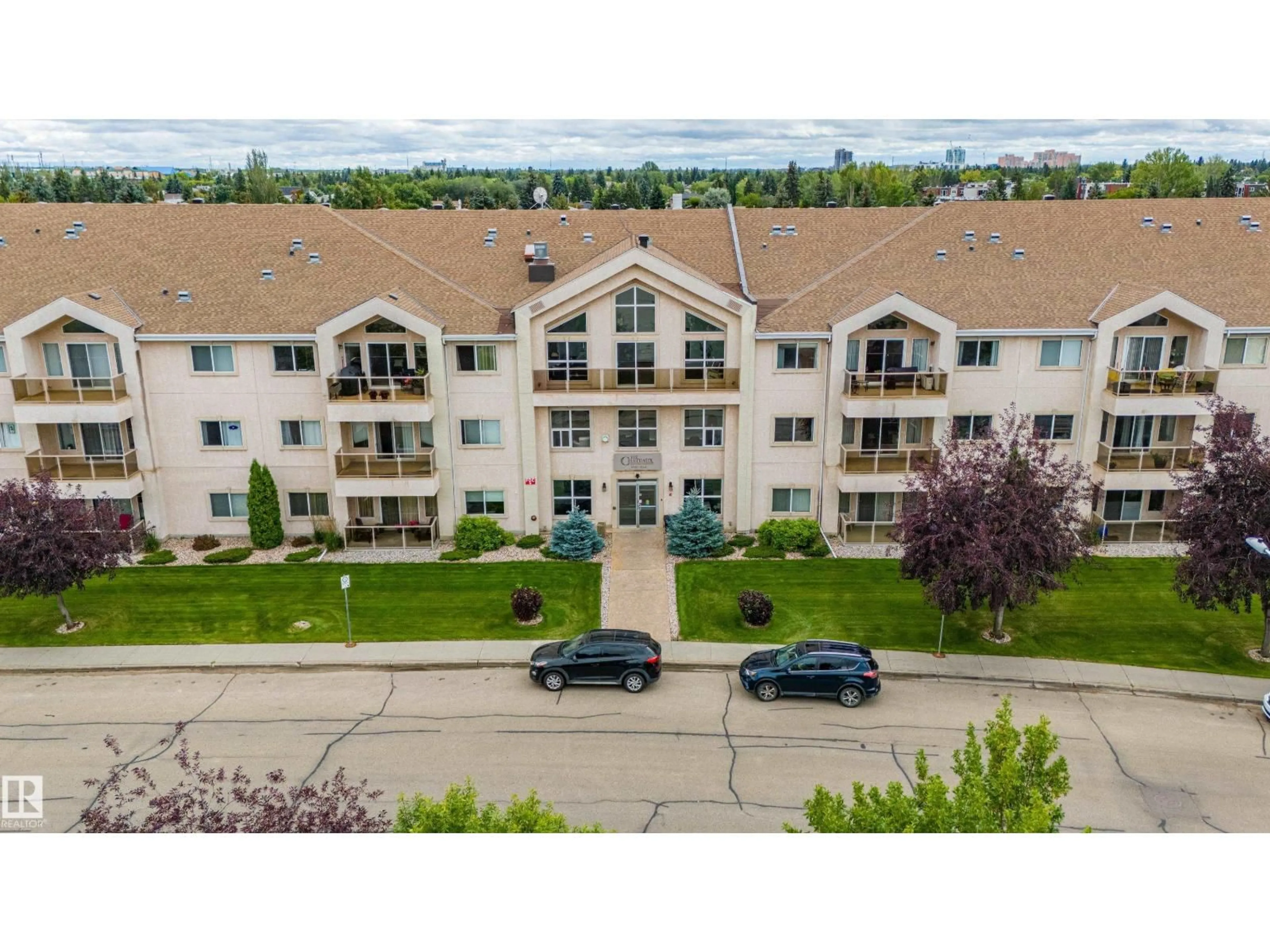 A pic from outside/outdoor area/front of a property/back of a property/a pic from drone, building for #208 - 10421 42 AV, Edmonton Alberta T6J7C8
