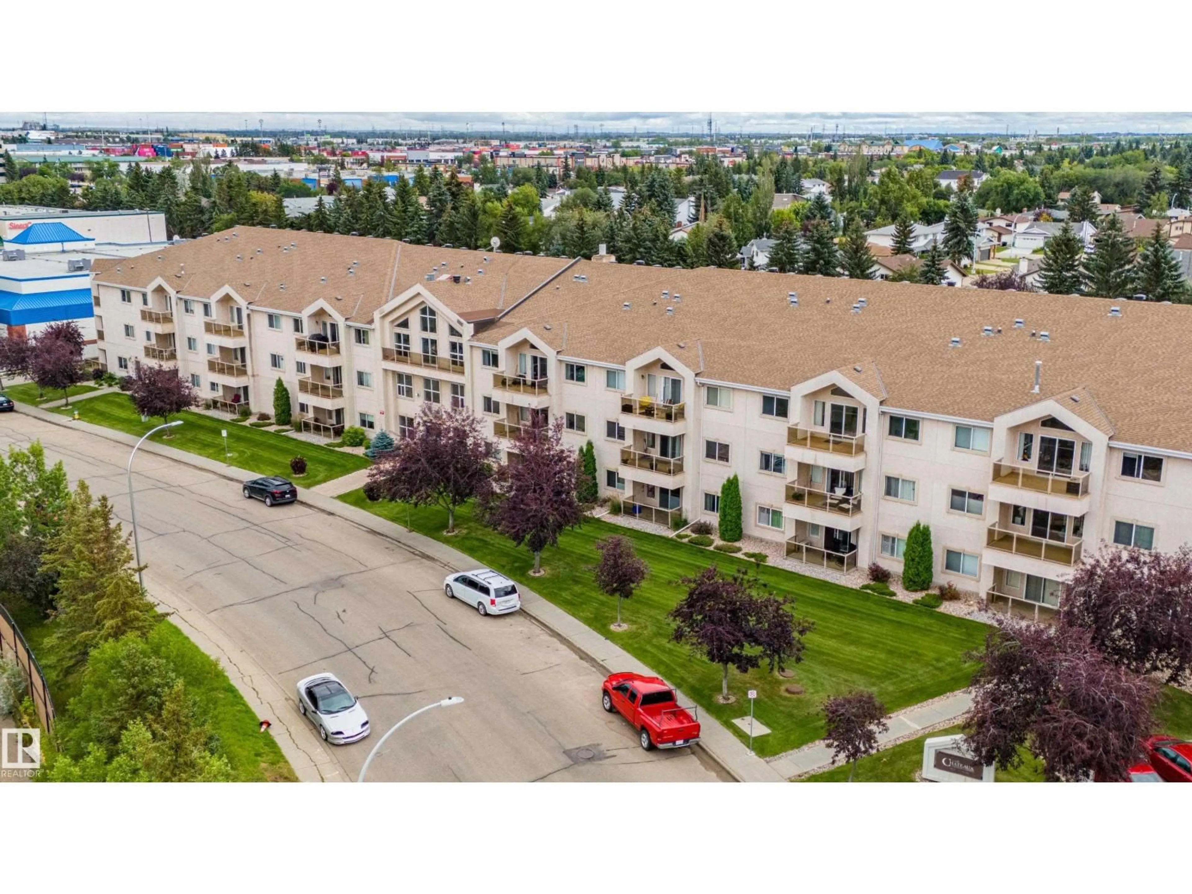 A pic from outside/outdoor area/front of a property/back of a property/a pic from drone, unknown for #208 - 10421 42 AV, Edmonton Alberta T6J7C8